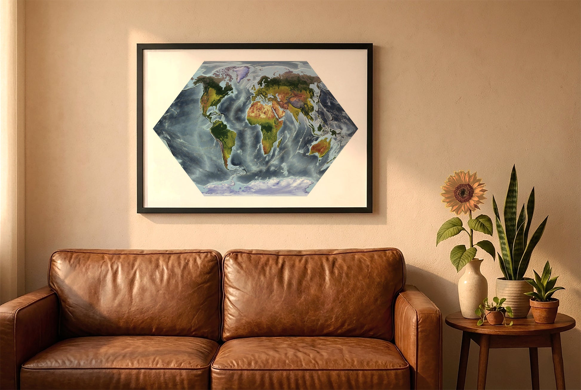World relief map in eckert projection in a black frame above a brown leather sofa. Boho living room with warm sunlight, sunflower, and indoor plants on a wooden side table