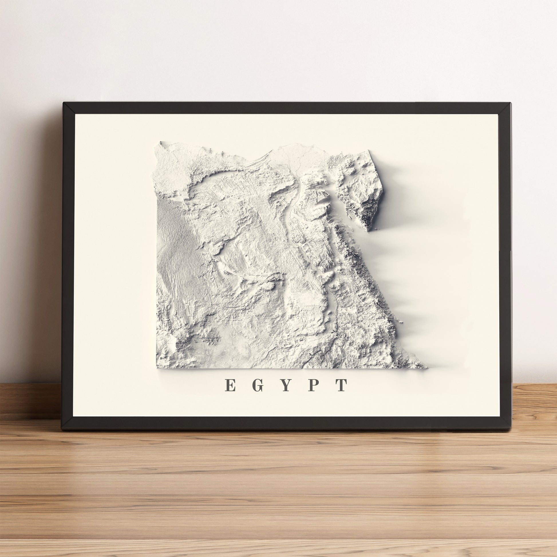 Egypt framed shaded relief map in black frame. Artistic print highlighting mountains with a realistic terrain effect