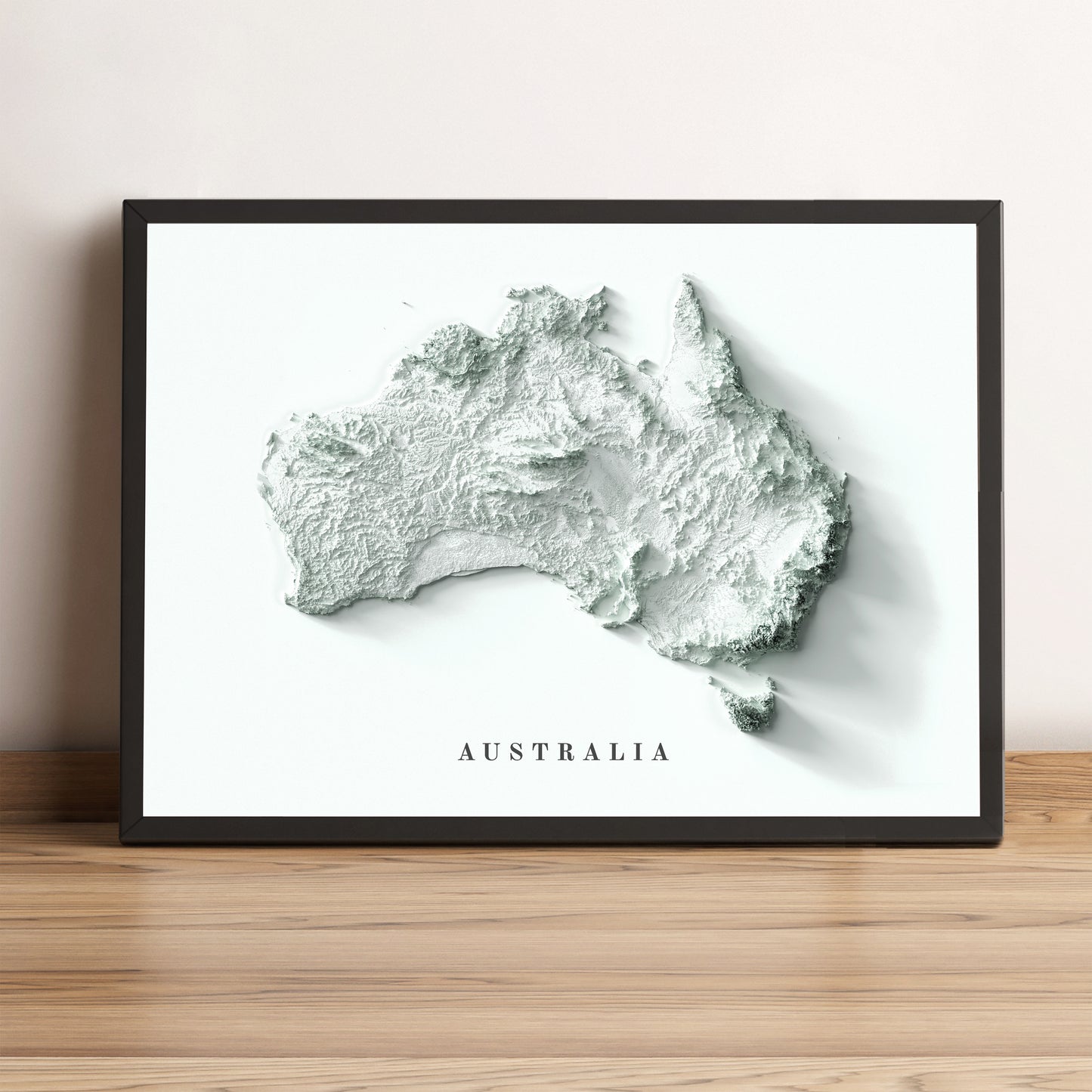 Australia minimalist framed shaded relief map in black frame. Artistic print highlighting mountains with a realistic terrain effect