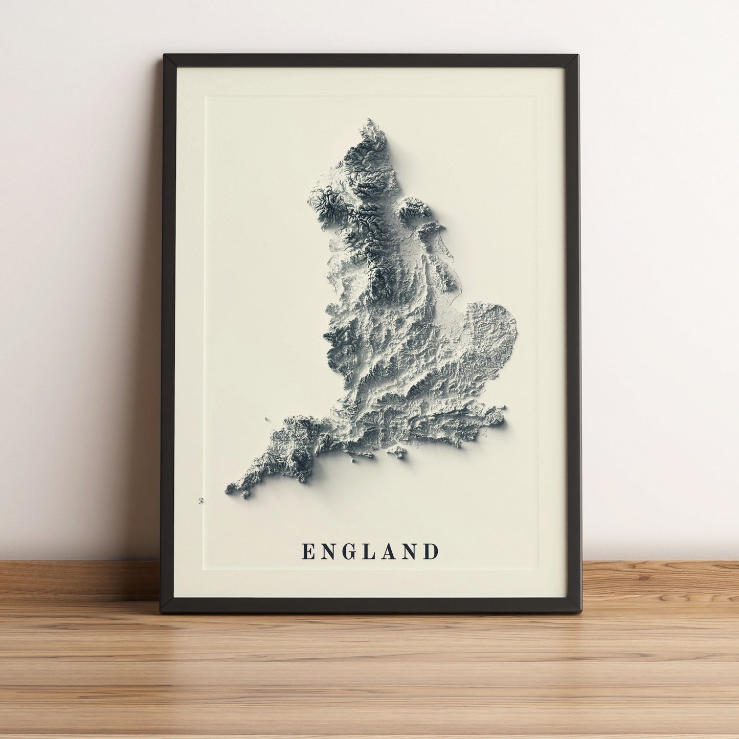 England framed shaded relief map in black frame. Artistic print highlighting mountains with a realistic terrain effect
