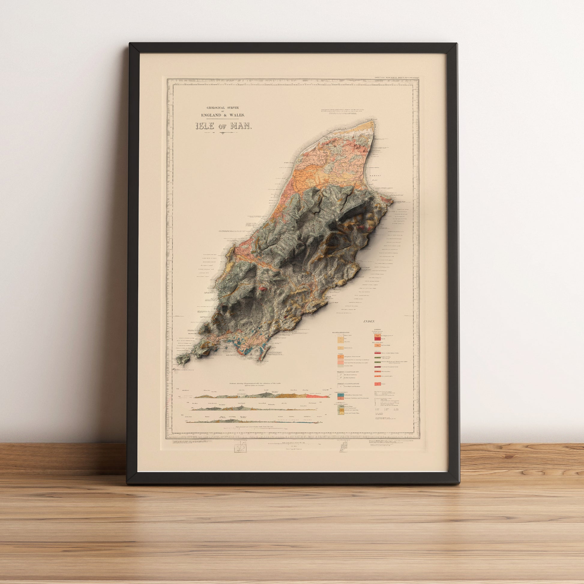 Isle of Man vintage framed shaded relief map in black frame. Artistic print highlighting mountains with a realistic terrain effect