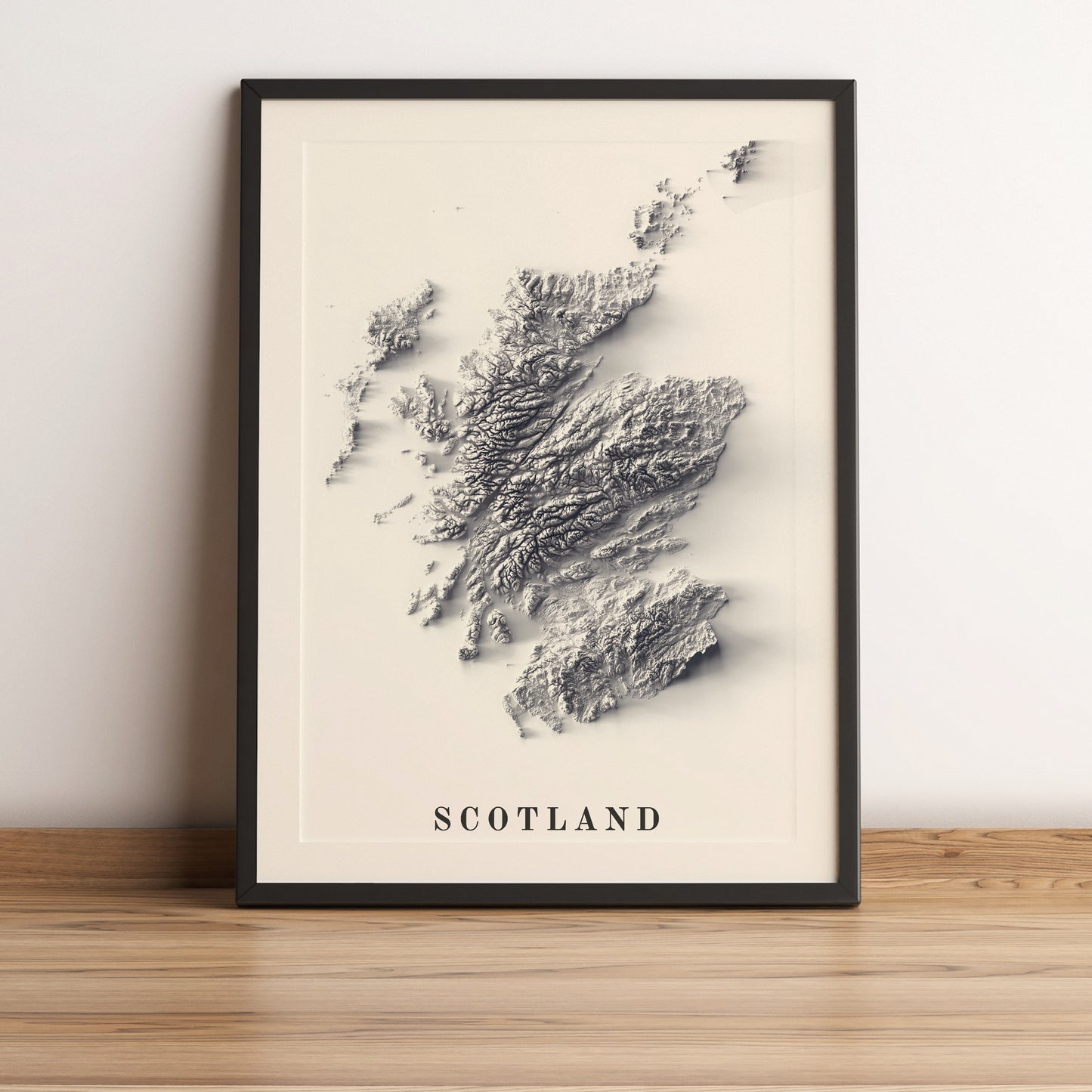 Scotland framed shaded relief map in black frame. Artistic print highlighting mountains with a realistic terrain effect