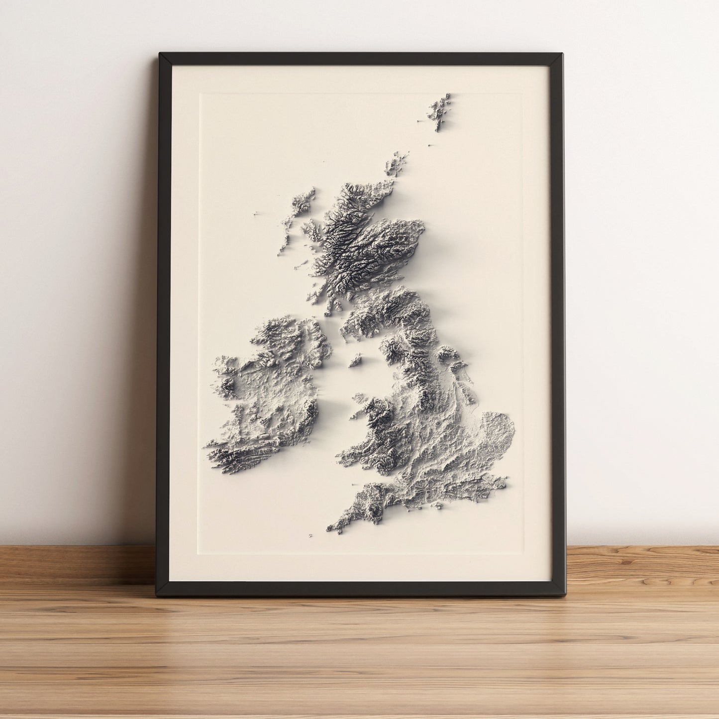 united kingdom and ireland framed shaded relief map in black frame. Artistic print highlighting mountains with a realistic terrain effect