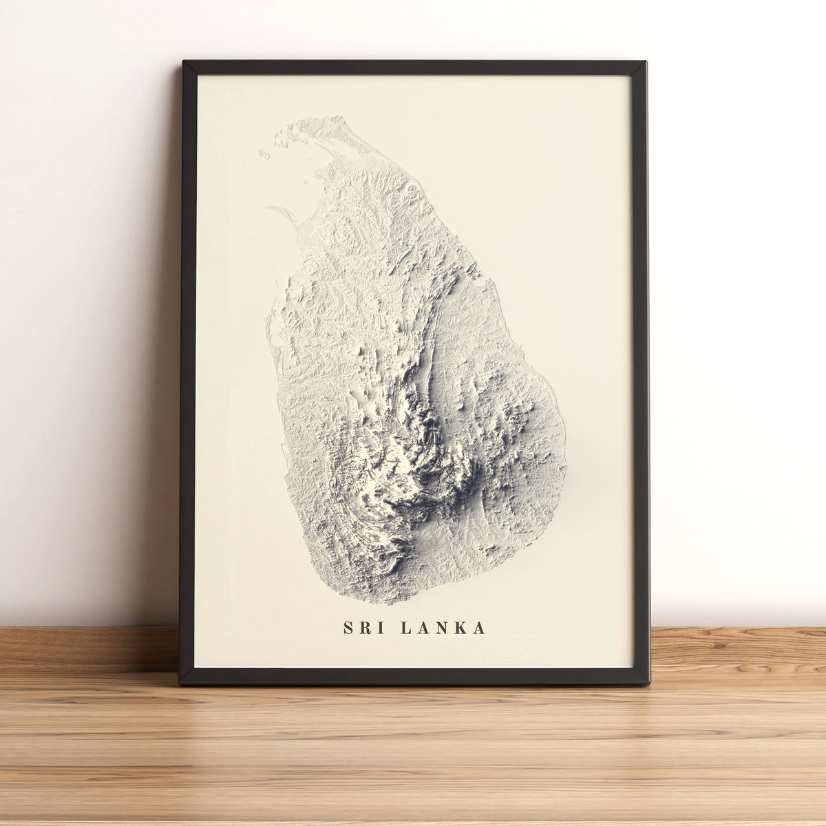 Sri Lanka framed shaded relief map in black frame. Artistic print highlighting mountains with a realistic terrain effect