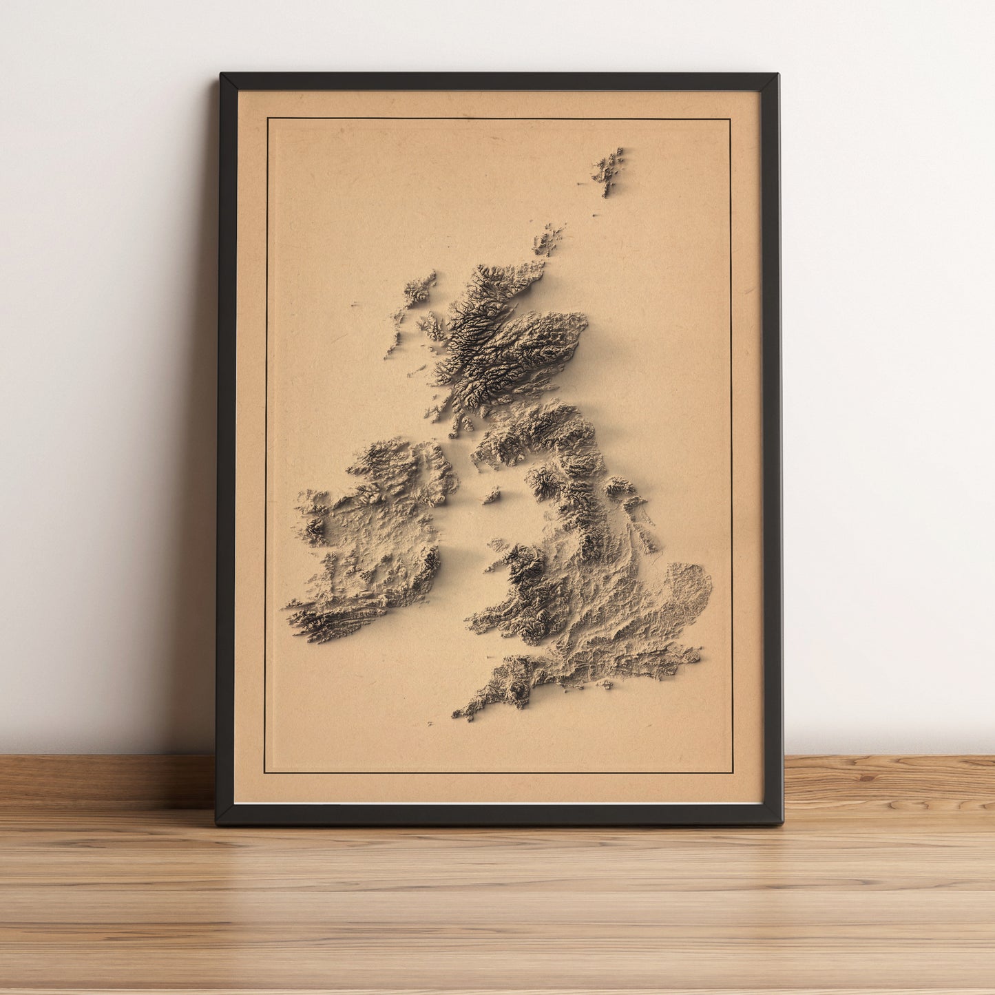 united kingdom and ireland framed shaded relief map in black frame. Artistic print highlighting mountains with a realistic terrain effect