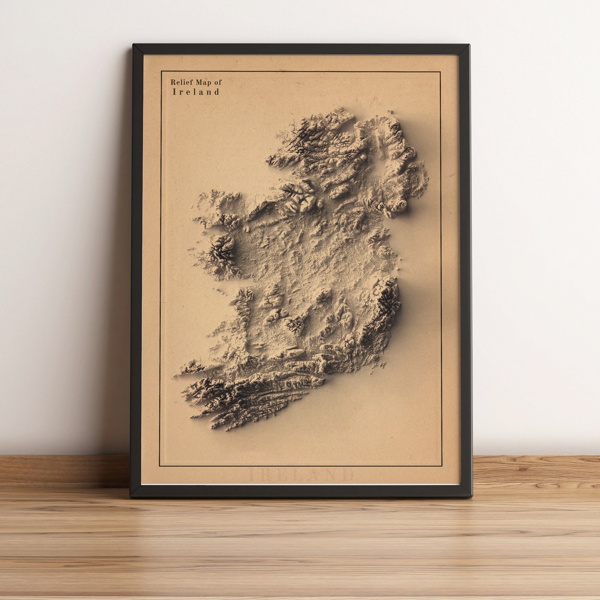 Ireland framed shaded relief map in black frame. Artistic print highlighting mountains with a realistic terrain effect