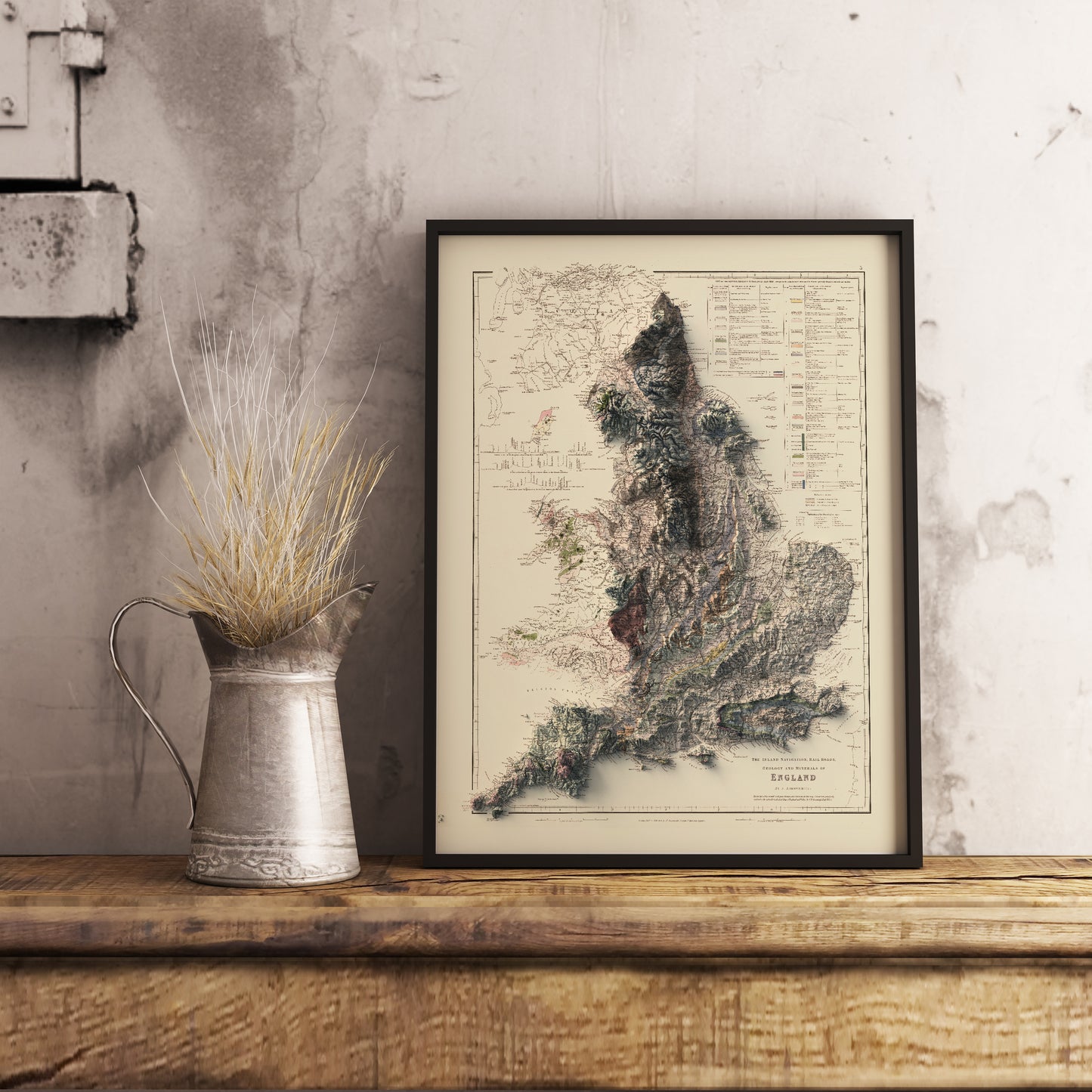 Vintage England shaded relief map in black frame. Realistic terrain art print for home decor, displayed on rustic wooden table