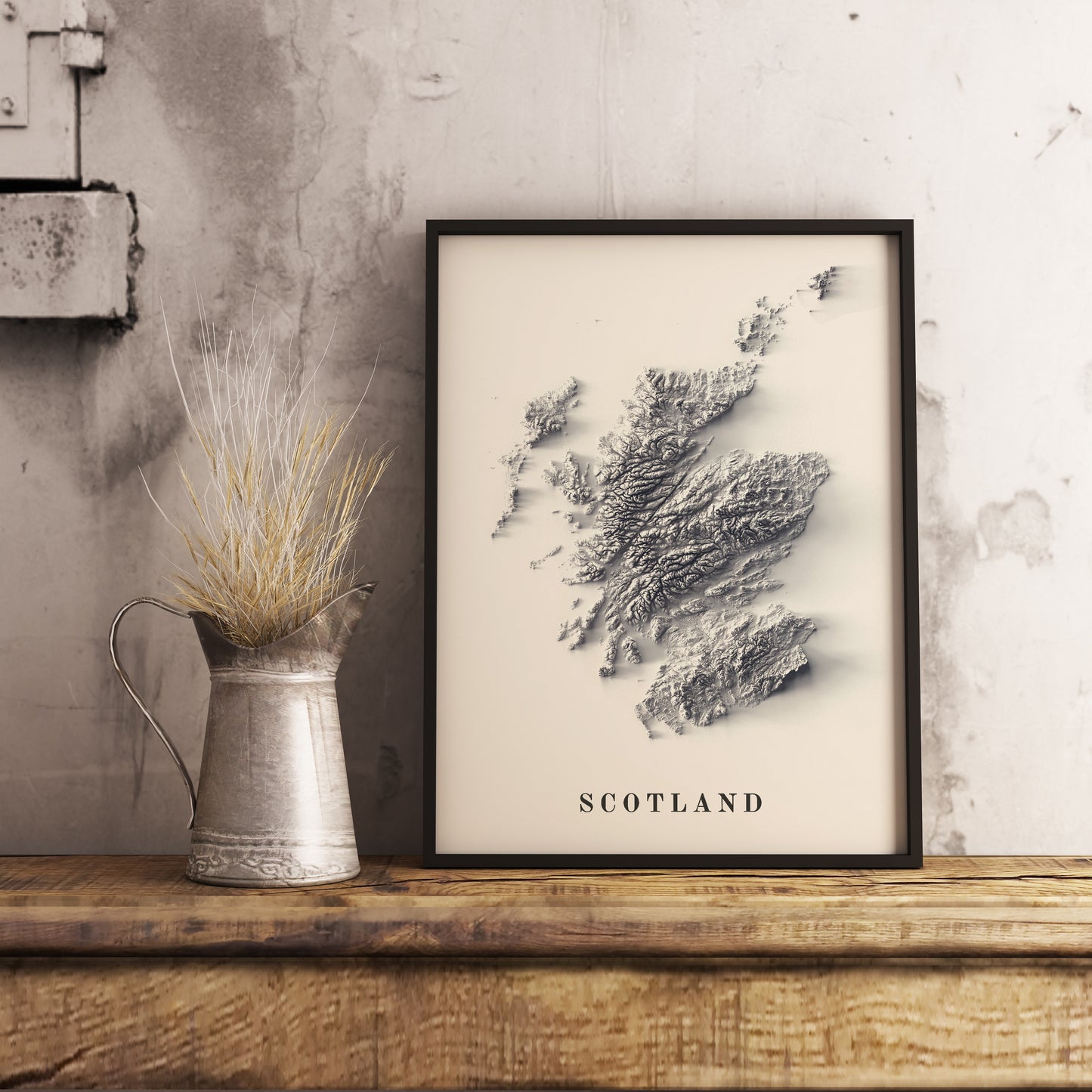 Scotland shaded relief map in black frame. Realistic terrain art print for home decor, displayed on rustic wooden table
