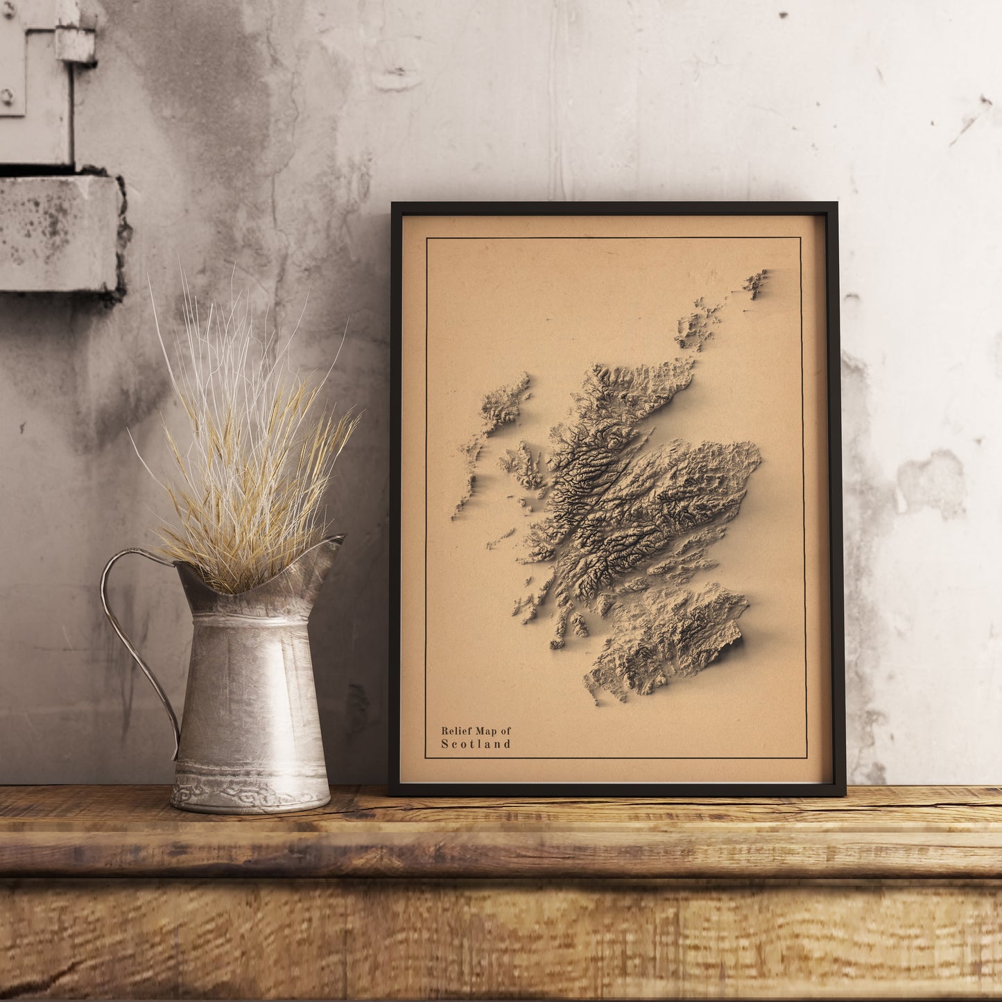Scotland shaded relief map in black frame. Realistic terrain art print for home decor, displayed on rustic wooden table