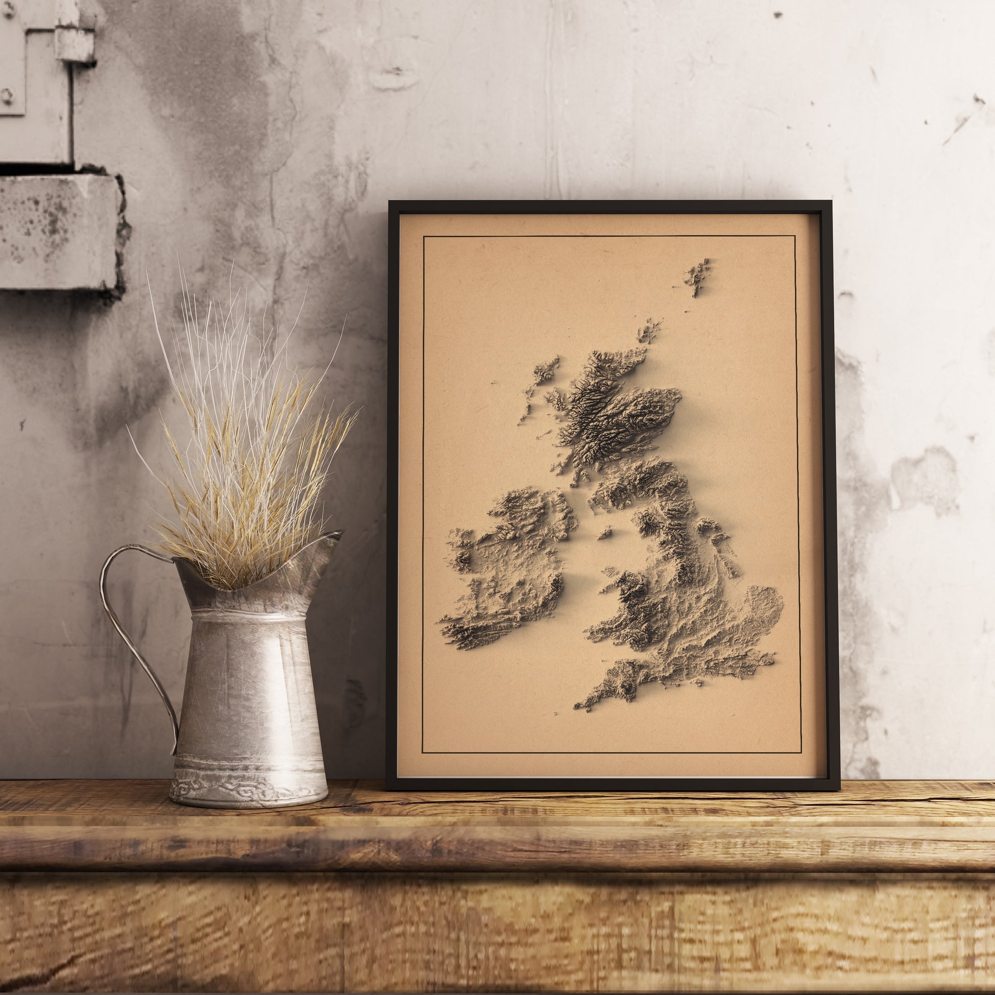 united kingdom and ireland shaded relief map in black frame. Realistic terrain art print for home decor, displayed on rustic wooden table