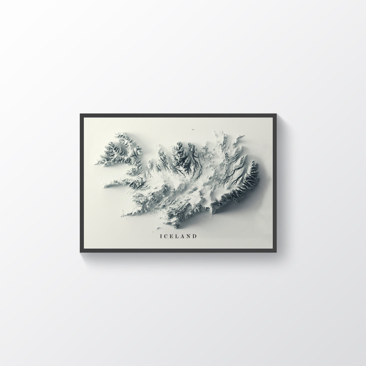 Iceland framed shaded relief map in black frame. Artistic print highlighting mountains with a realistic terrain effect