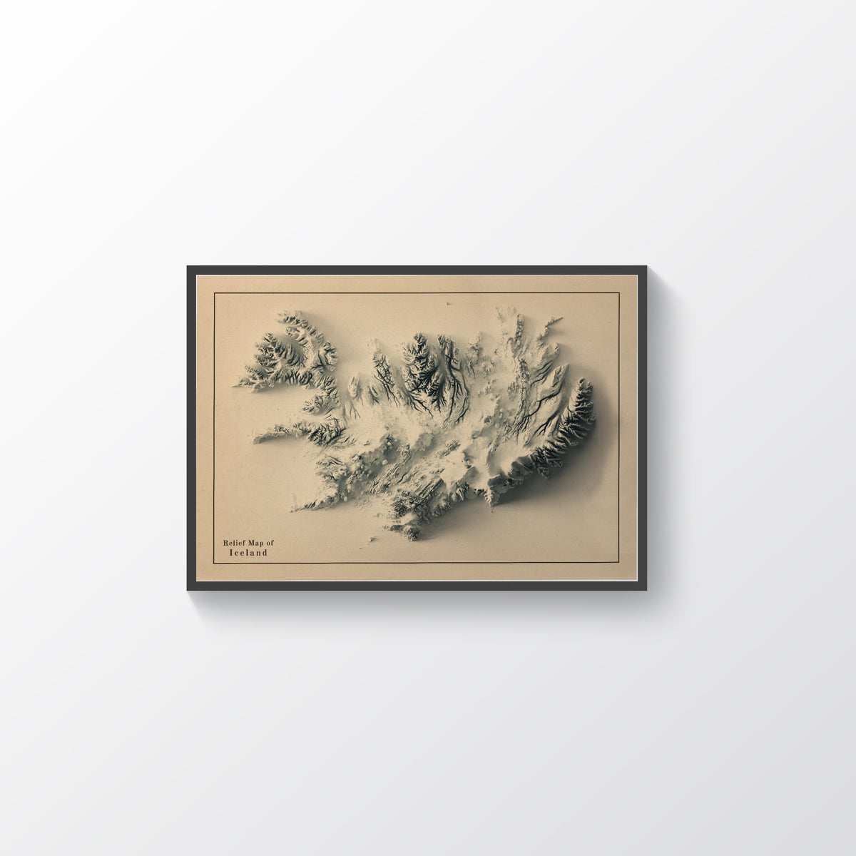 Iceland framed shaded relief map in black frame. Artistic print highlighting mountains with a realistic terrain effect