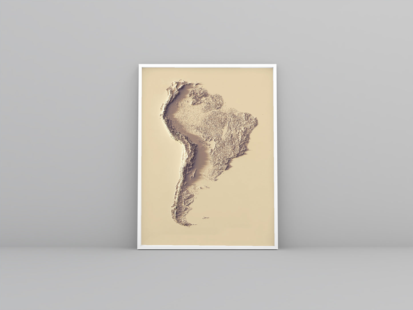 South America framed shaded relief map in white frame. Artistic print highlighting mountains with a realistic 3d effect