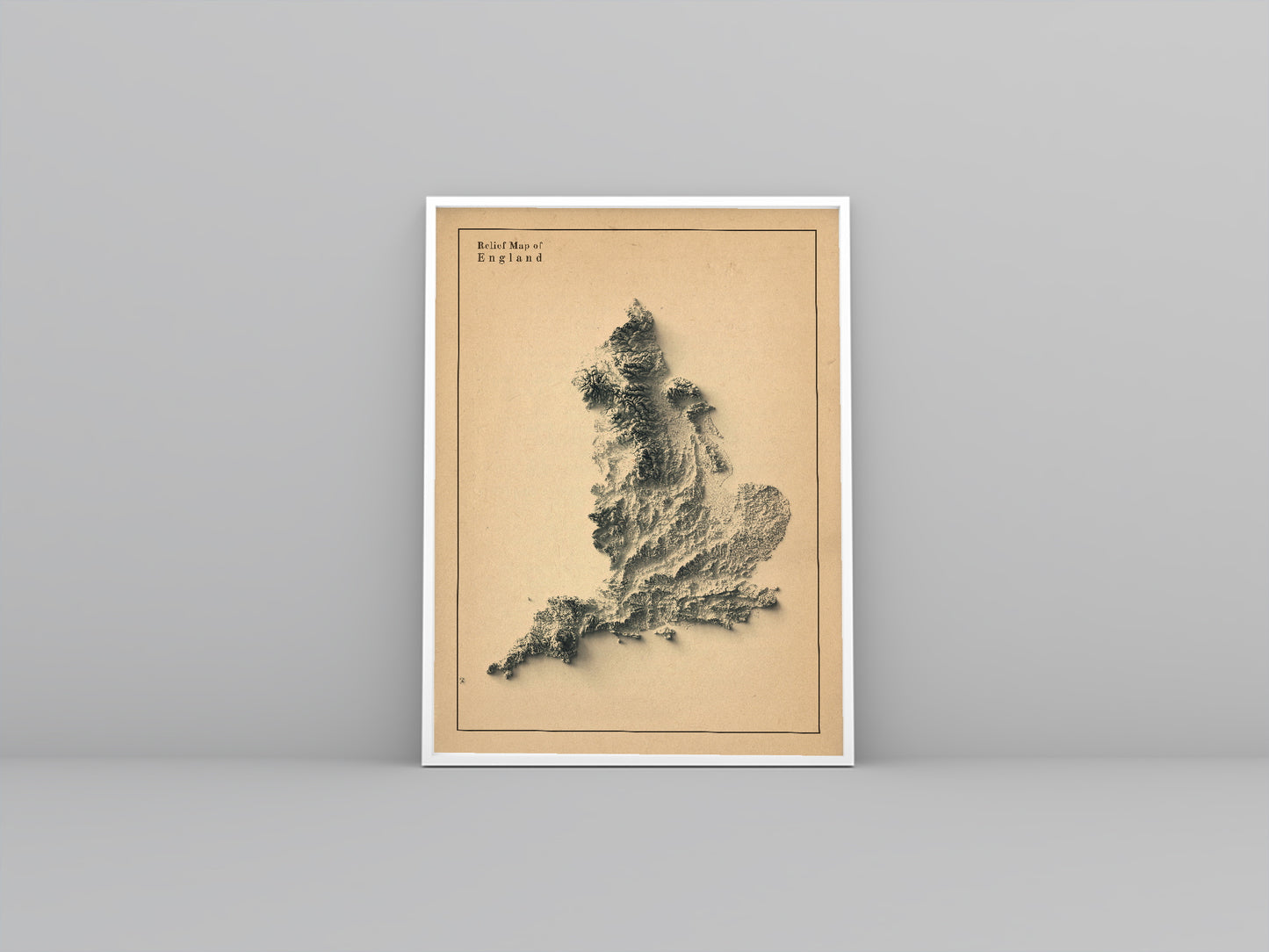 England framed shaded relief map in white frame. Artistic print highlighting mountains with a realistic 3d effect