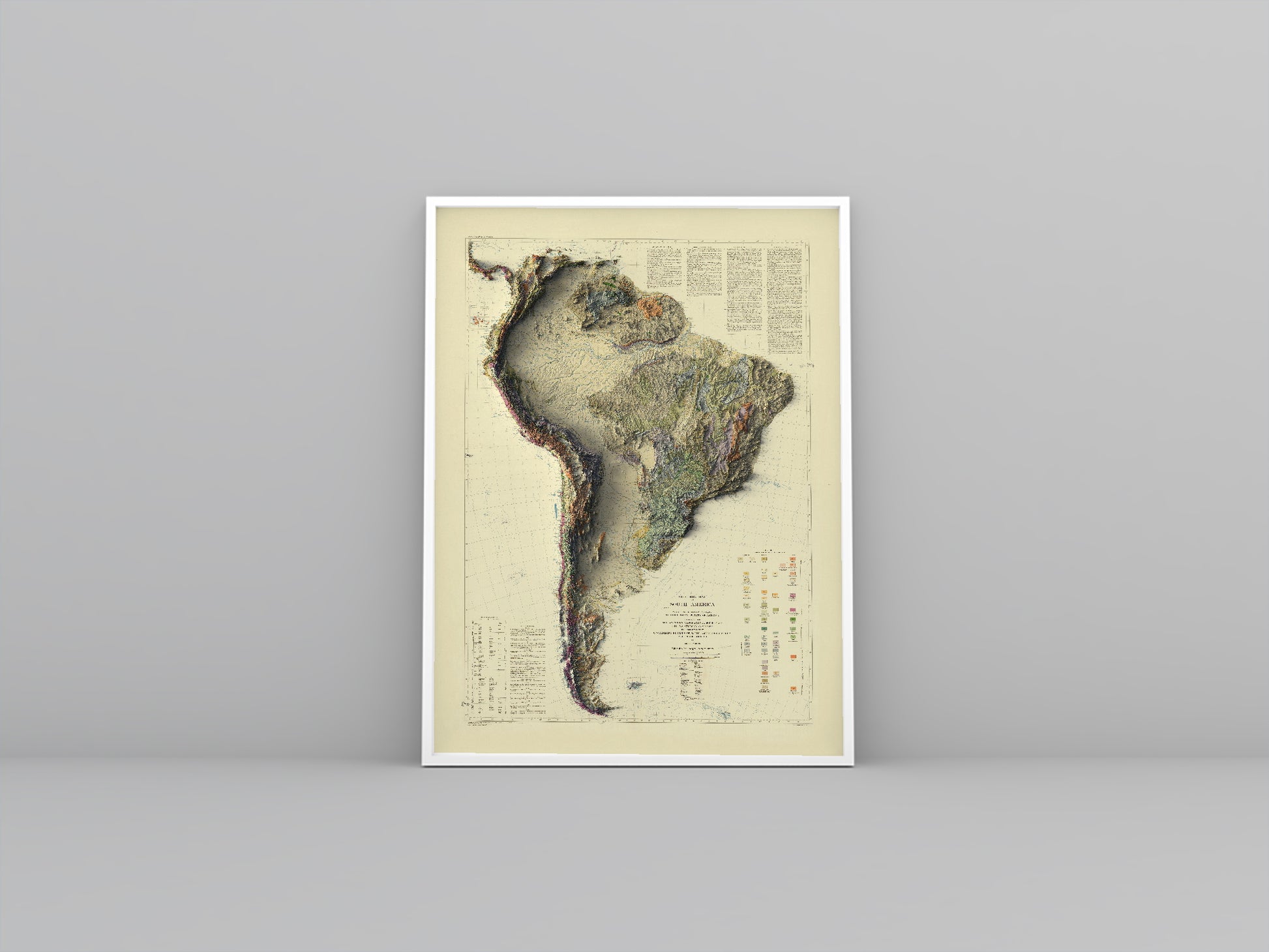 South America vintage framed shaded relief map in white frame. Artistic print highlighting mountains with a realistic 3d effect