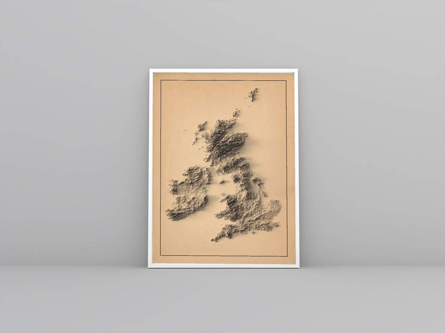 united kingdom and ireland framed shaded relief map in white frame. Artistic print highlighting mountains with a realistic 3d effect