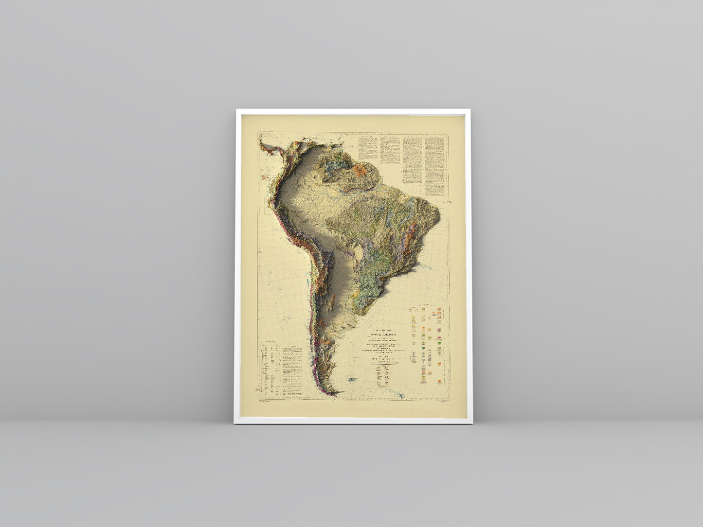 South America vintage framed shaded relief map in white frame. Artistic print highlighting mountains with a realistic 3d effect