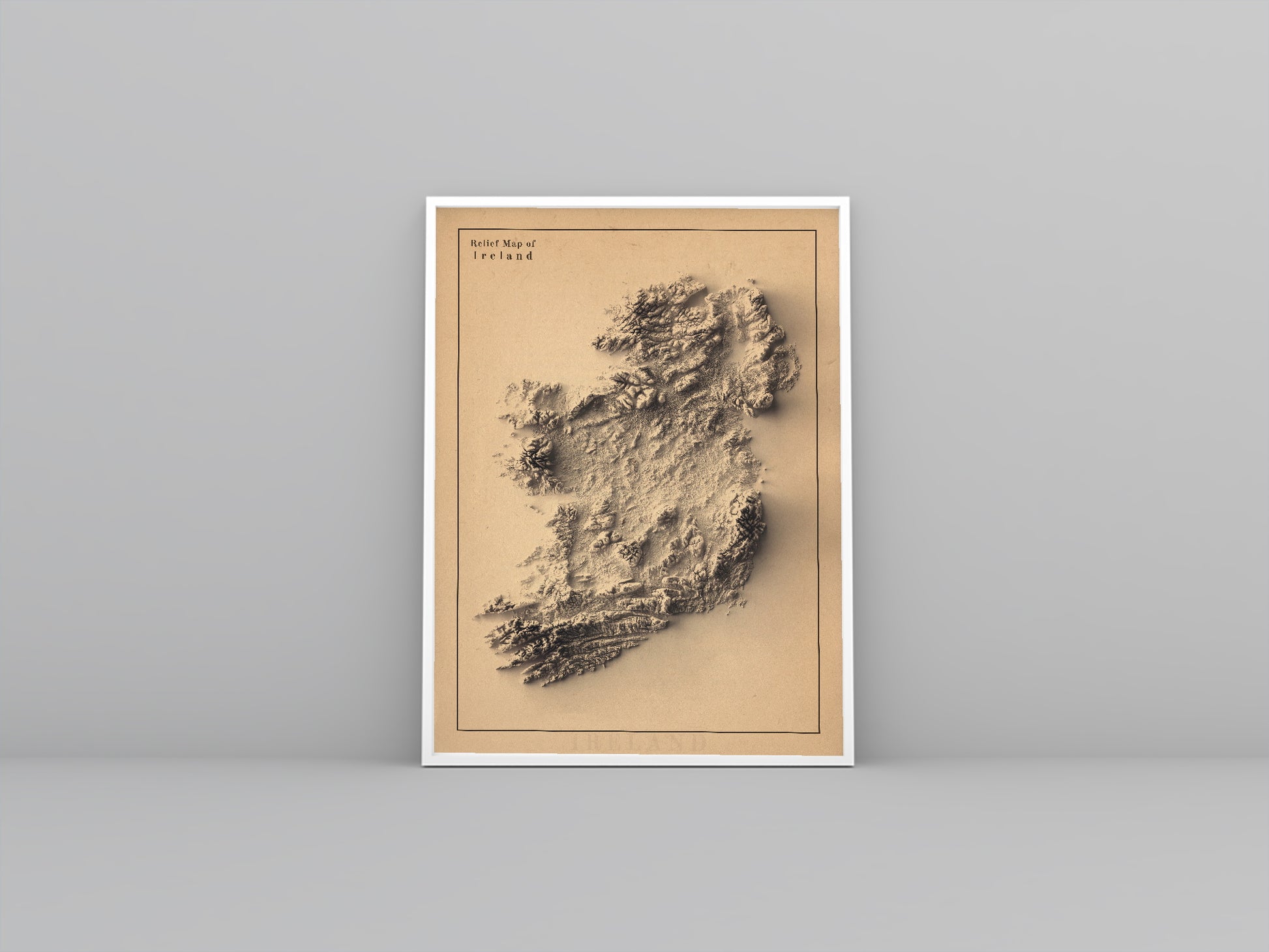 Ireland framed shaded relief map in white frame. Artistic print highlighting mountains with a realistic 3d effect