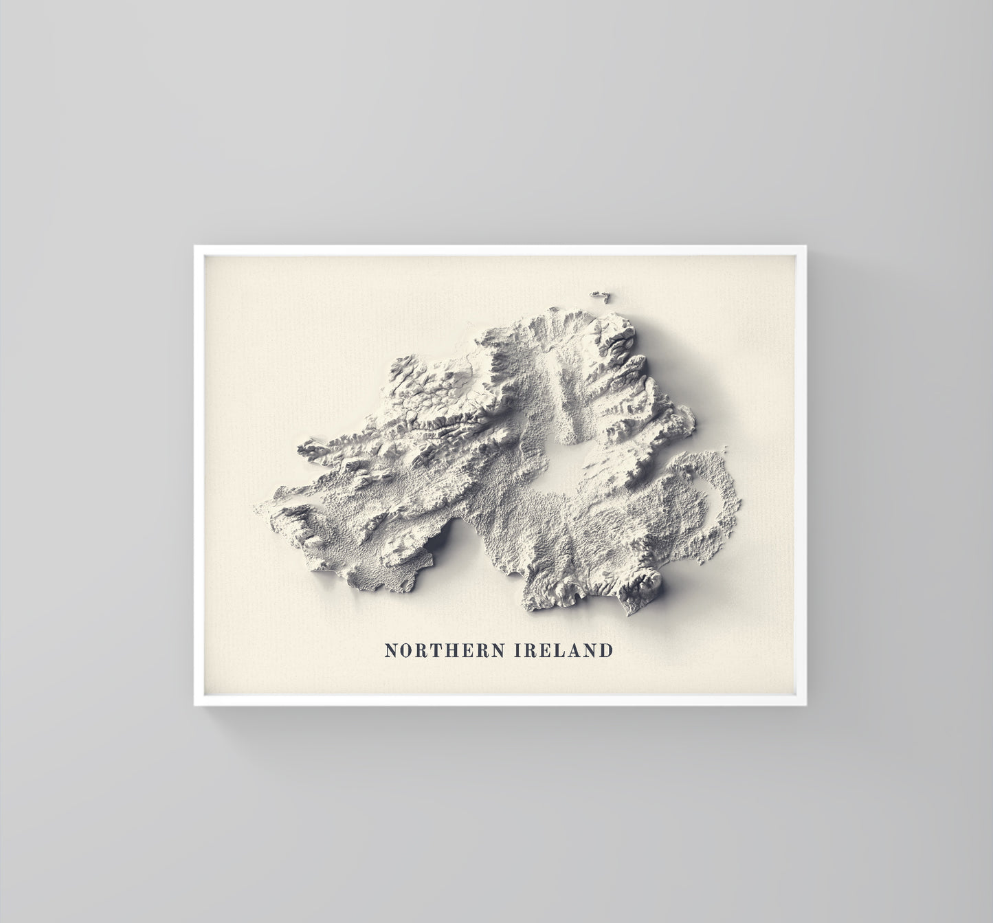 northern ireland framed shaded relief map in white frame. Artistic print highlighting mountains with a realistic 3d effect