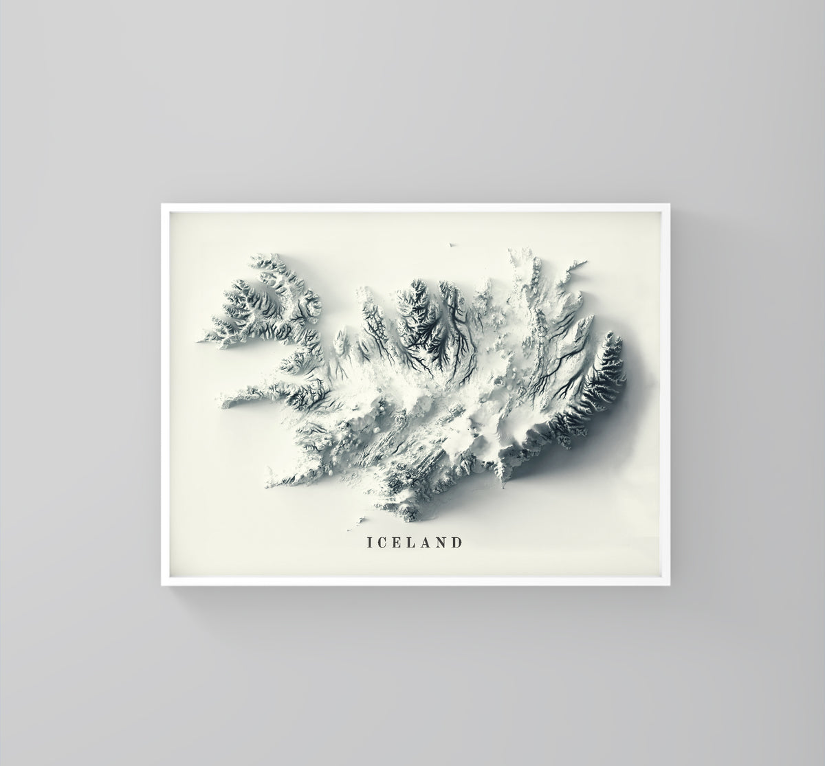 Iceland framed shaded relief map in white frame. Artistic print highlighting mountains with a realistic 3d effect