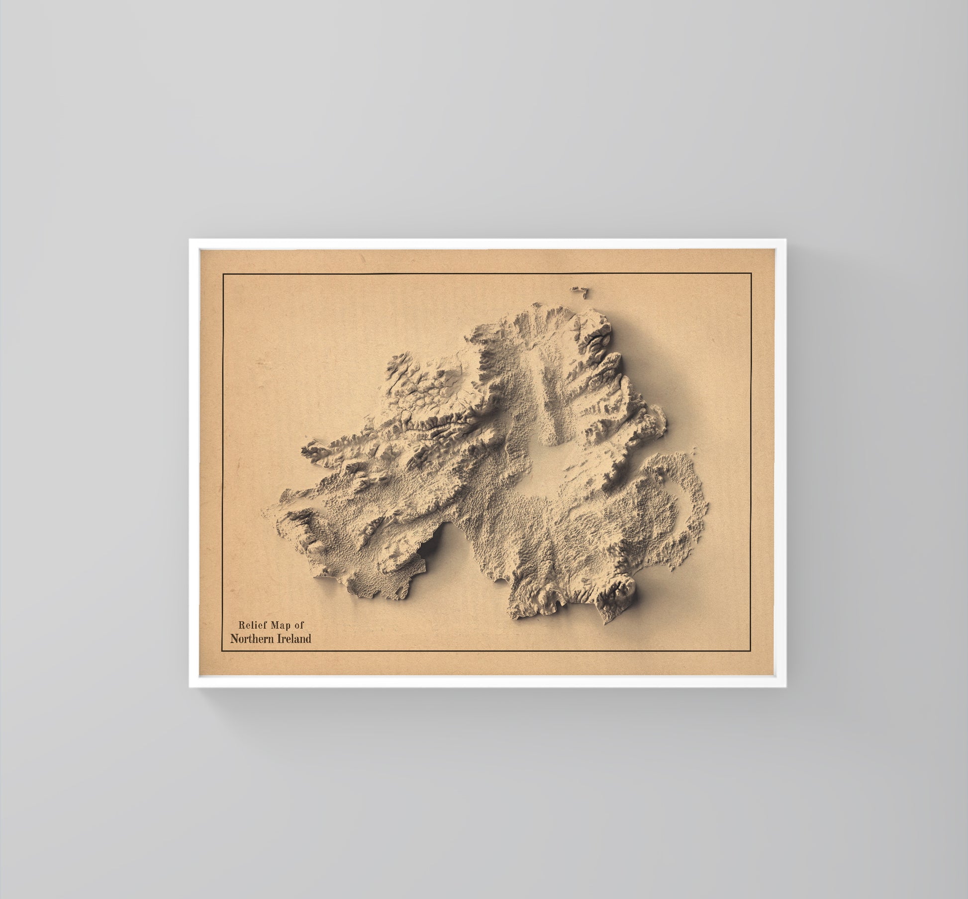northern ireland framed shaded relief map in white frame. Artistic print highlighting mountains with a realistic 3d effect