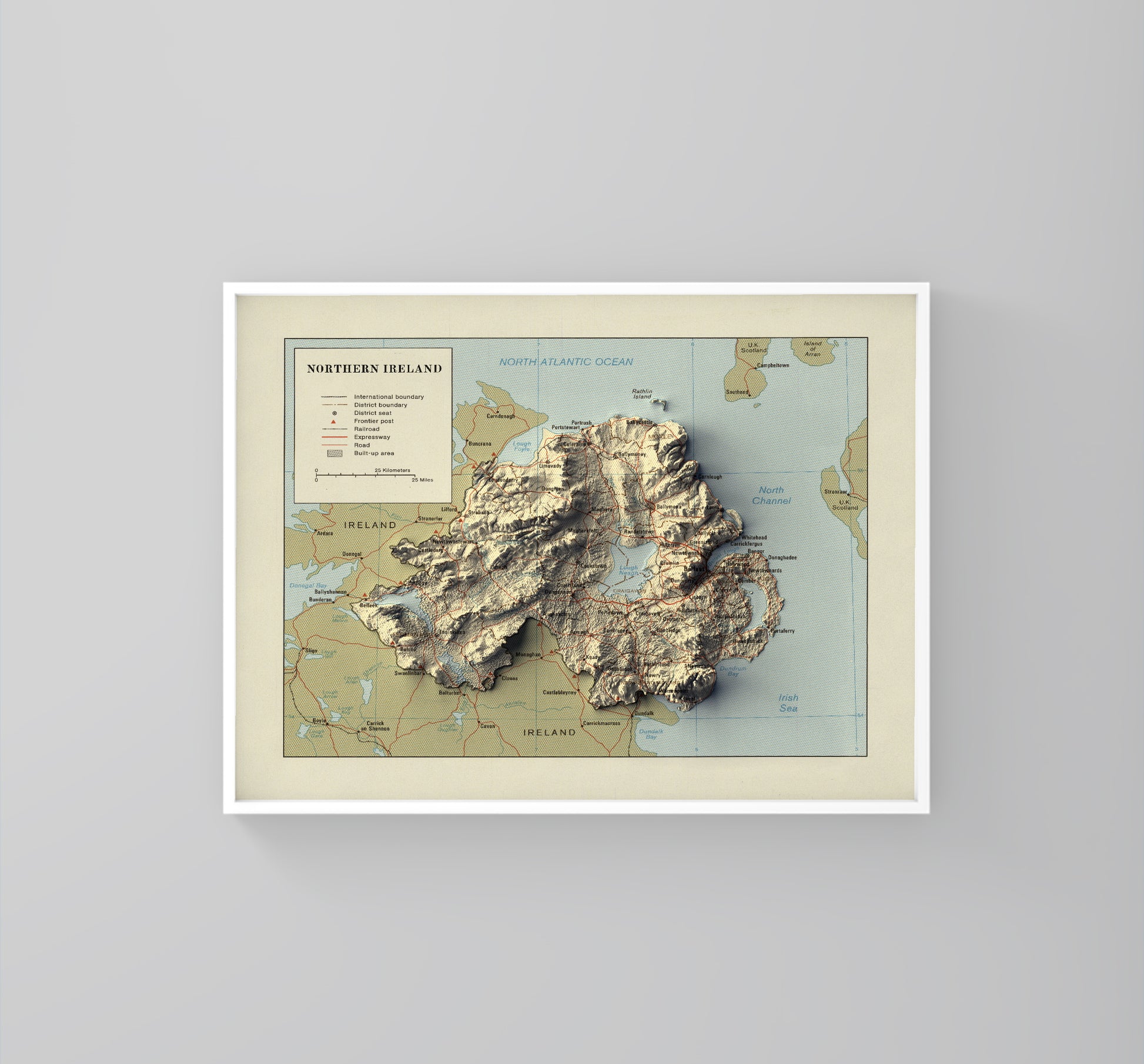northern ireland vintage framed shaded relief map in white frame. Artistic print highlighting mountains with a realistic 3d effect