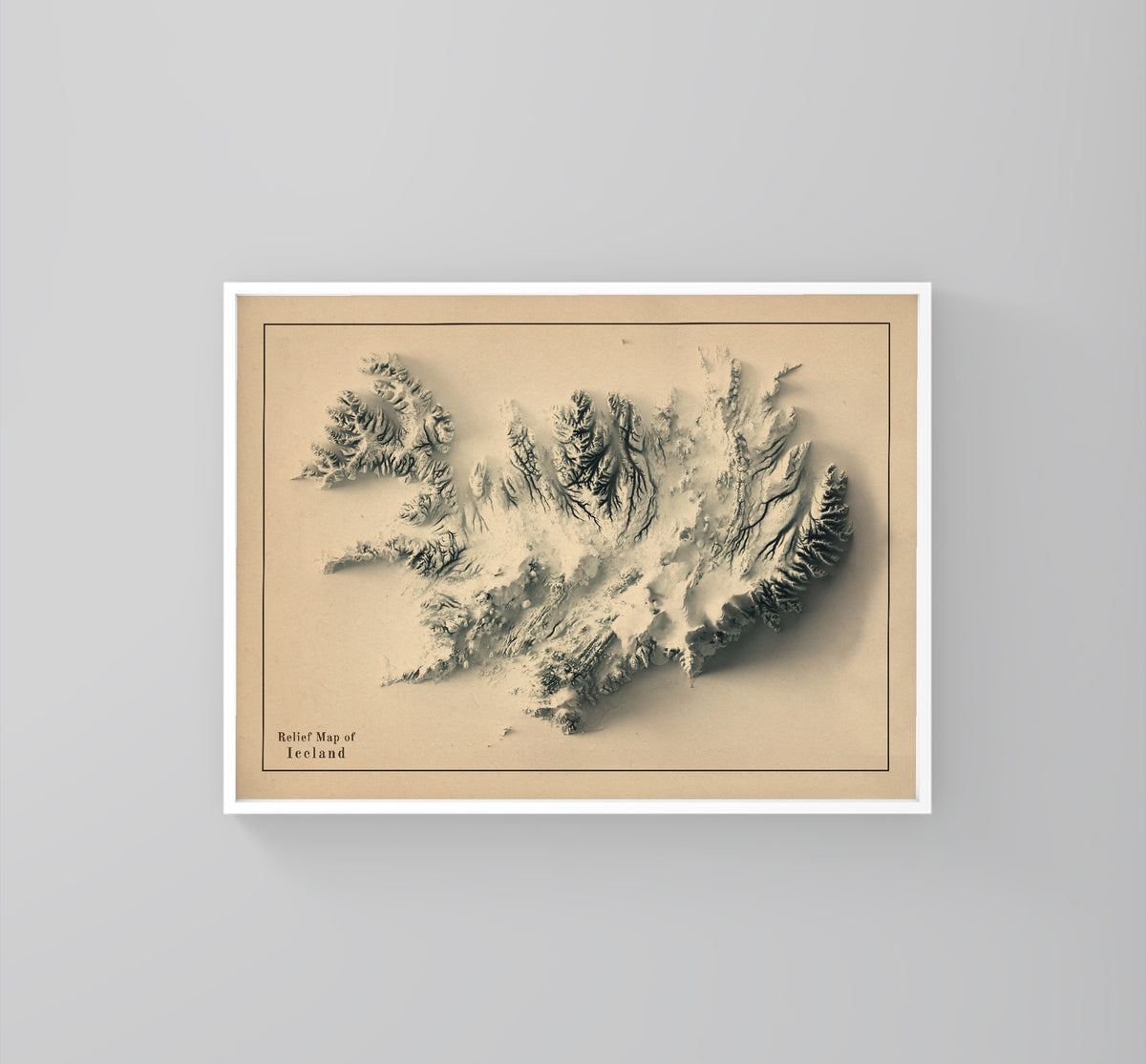 Iceland vintage framed shaded relief map in white frame. Artistic print highlighting mountains with a realistic 3d effect
