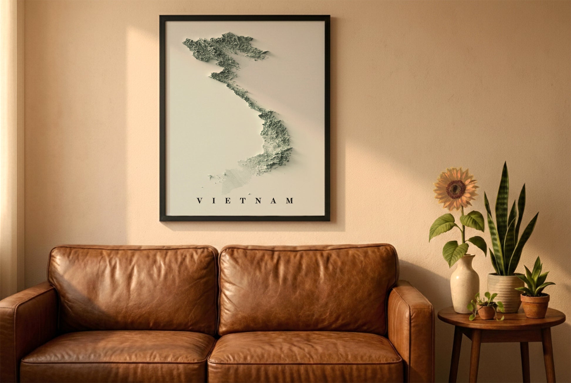 Vietnam shaded relief map in a wooden frame. Realistic terrain art print for home decor, displayed against a brick wall