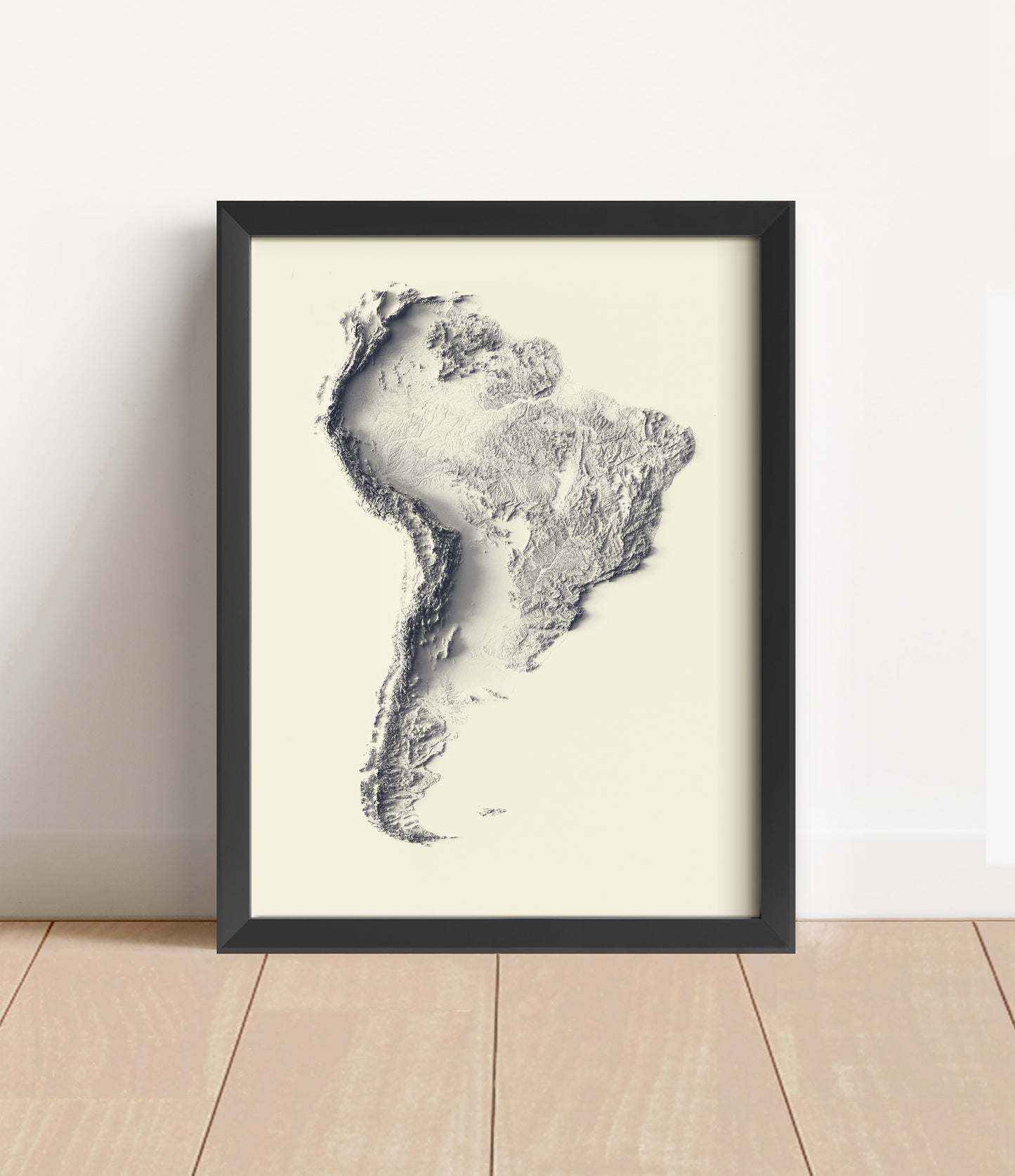 South America shaded relief map in black frame. Artistic print with realistic terrain effect for wall decor