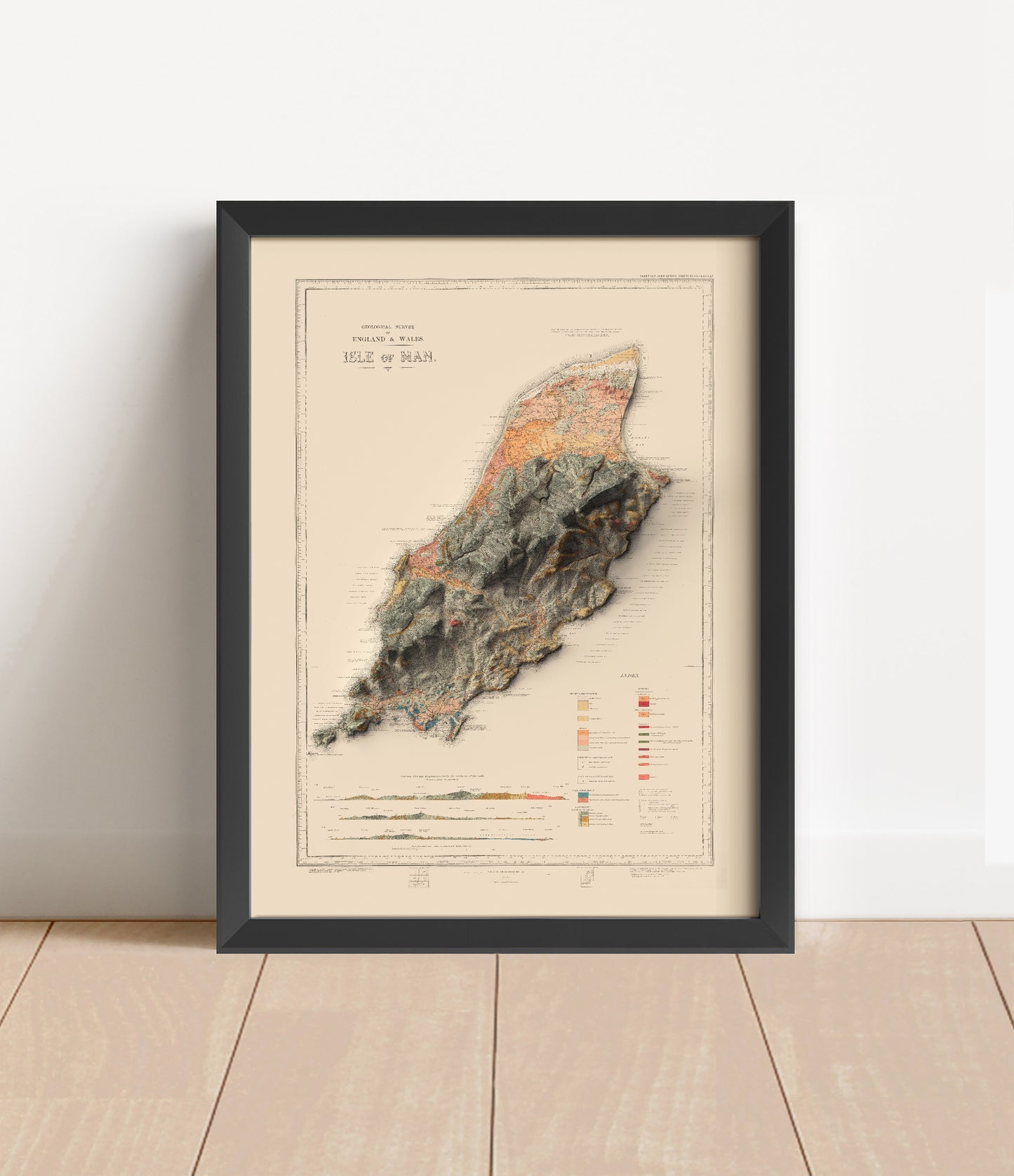 Vintage Isle of Man shaded relief map in black frame. Artistic print with realistic terrain effect for wall decor