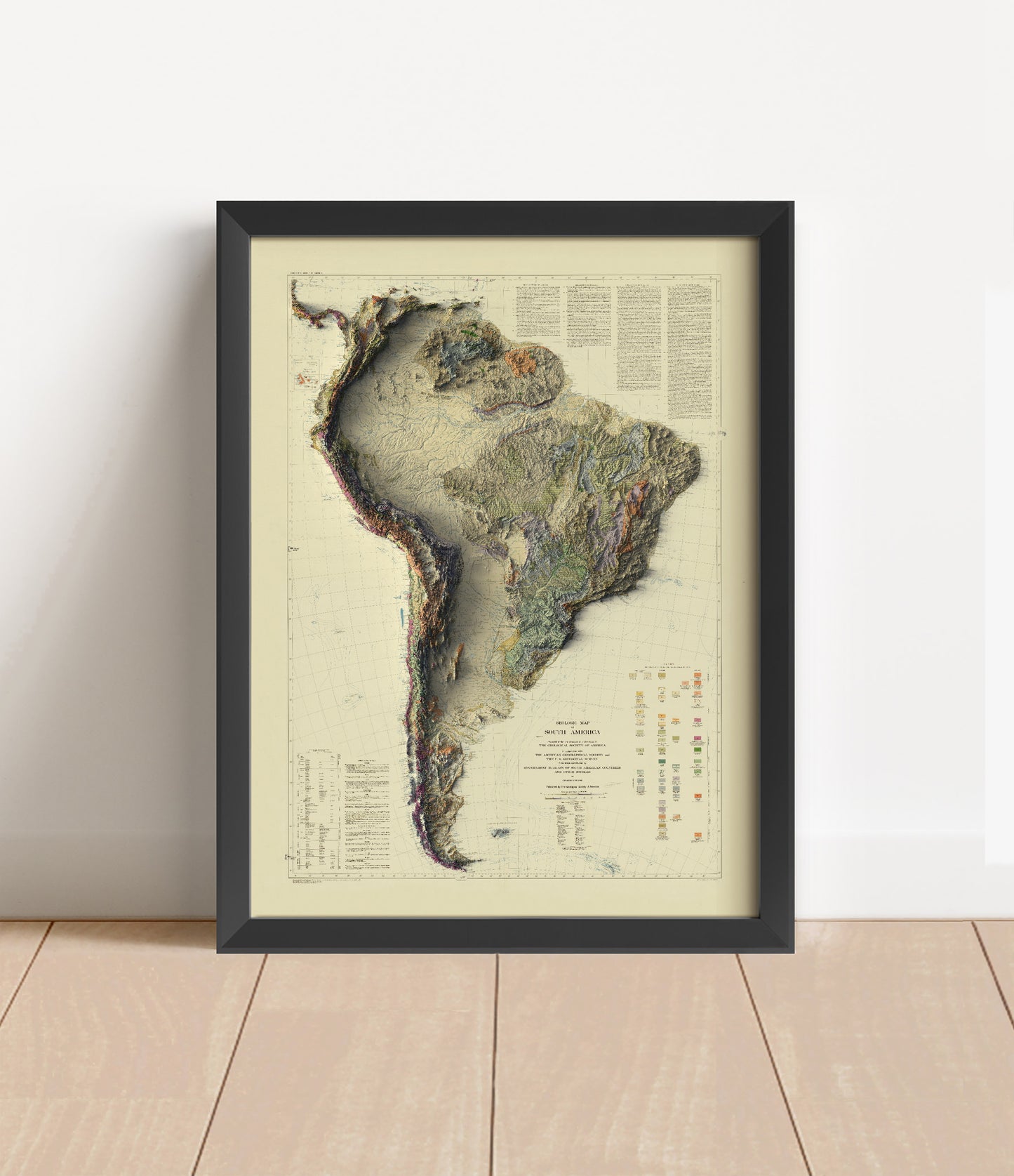 Vintage South America shaded relief map in black frame. Artistic print with realistic terrain effect for wall decor