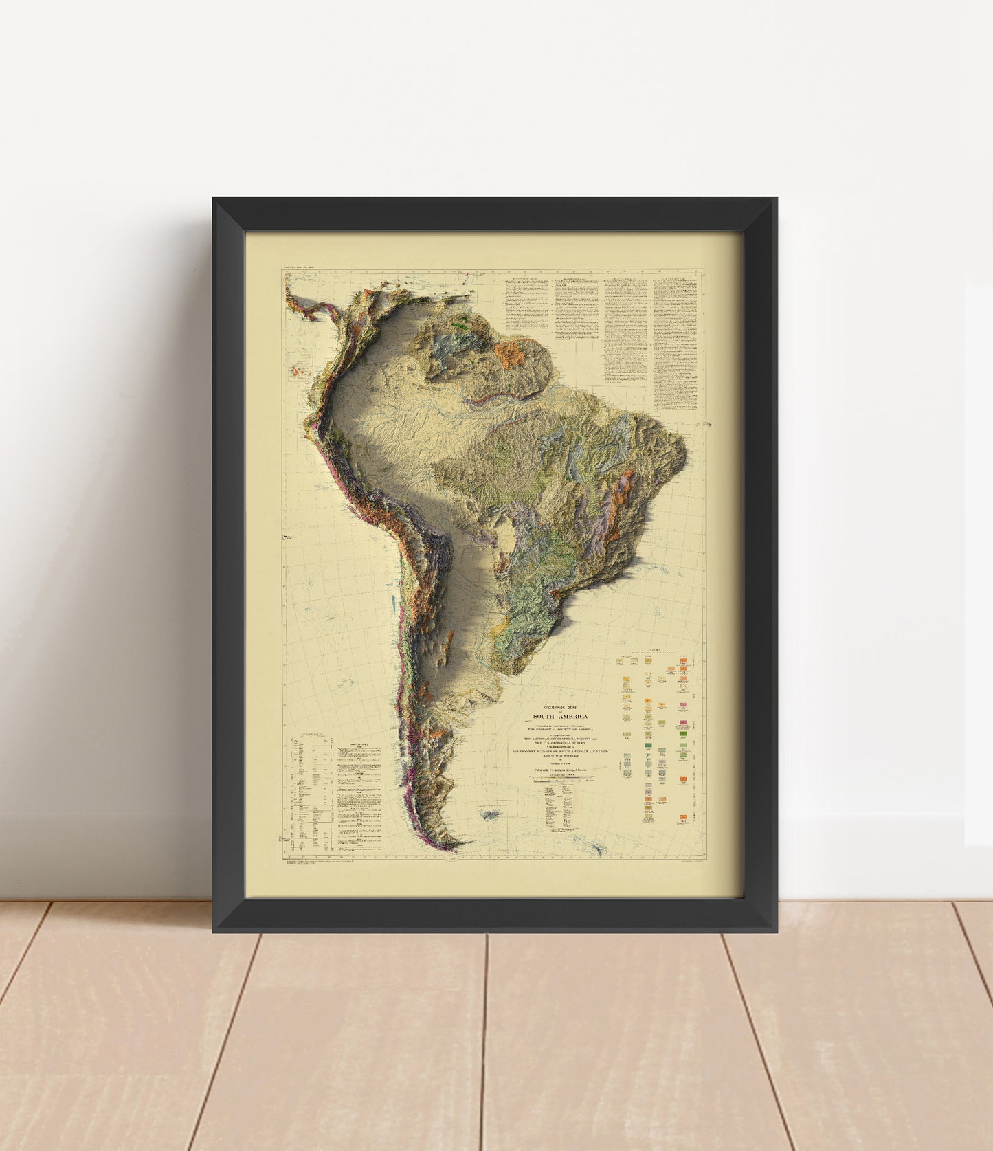 Vintage South America shaded relief map in black frame. Artistic print with realistic terrain effect for wall decor