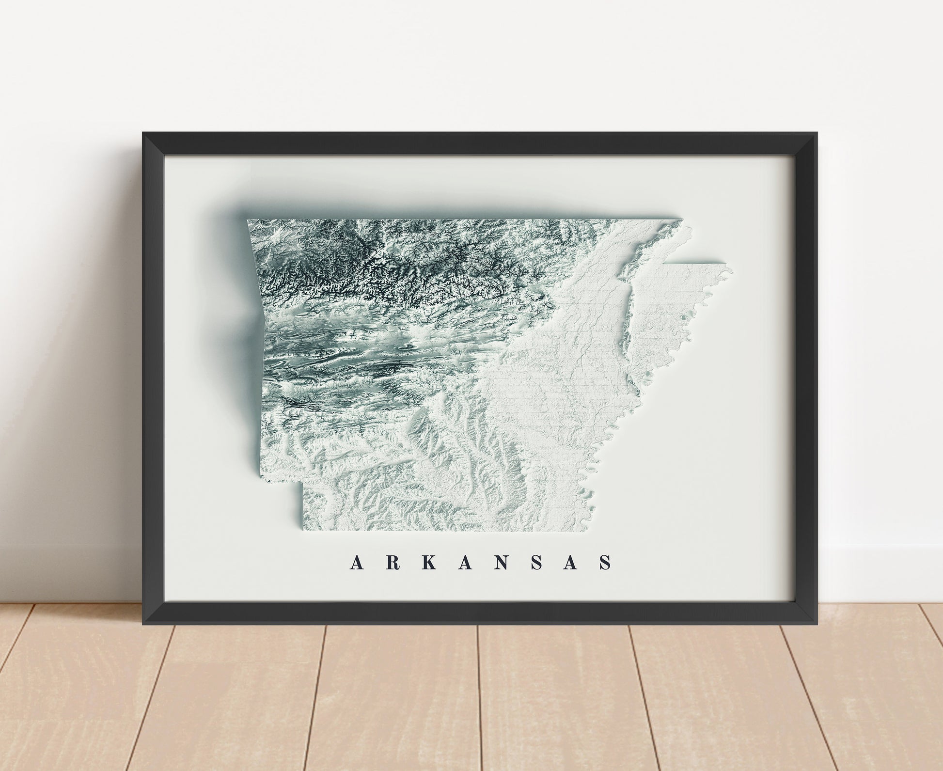 Arkansas shaded relief map in black frame. Artistic print with realistic terrain effect for wall decor