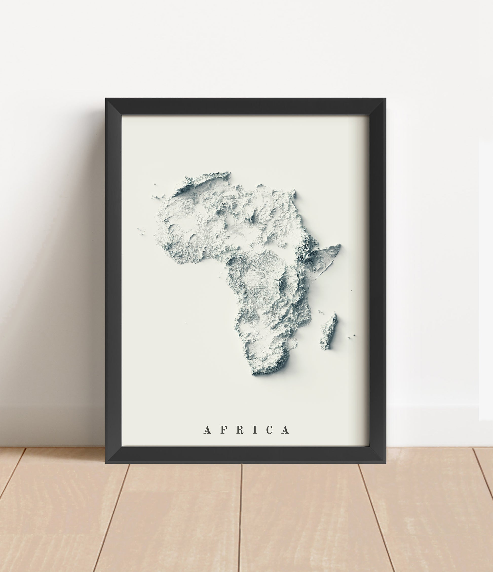 Africa shaded relief map in black frame. Artistic print with realistic terrain effect for wall decor