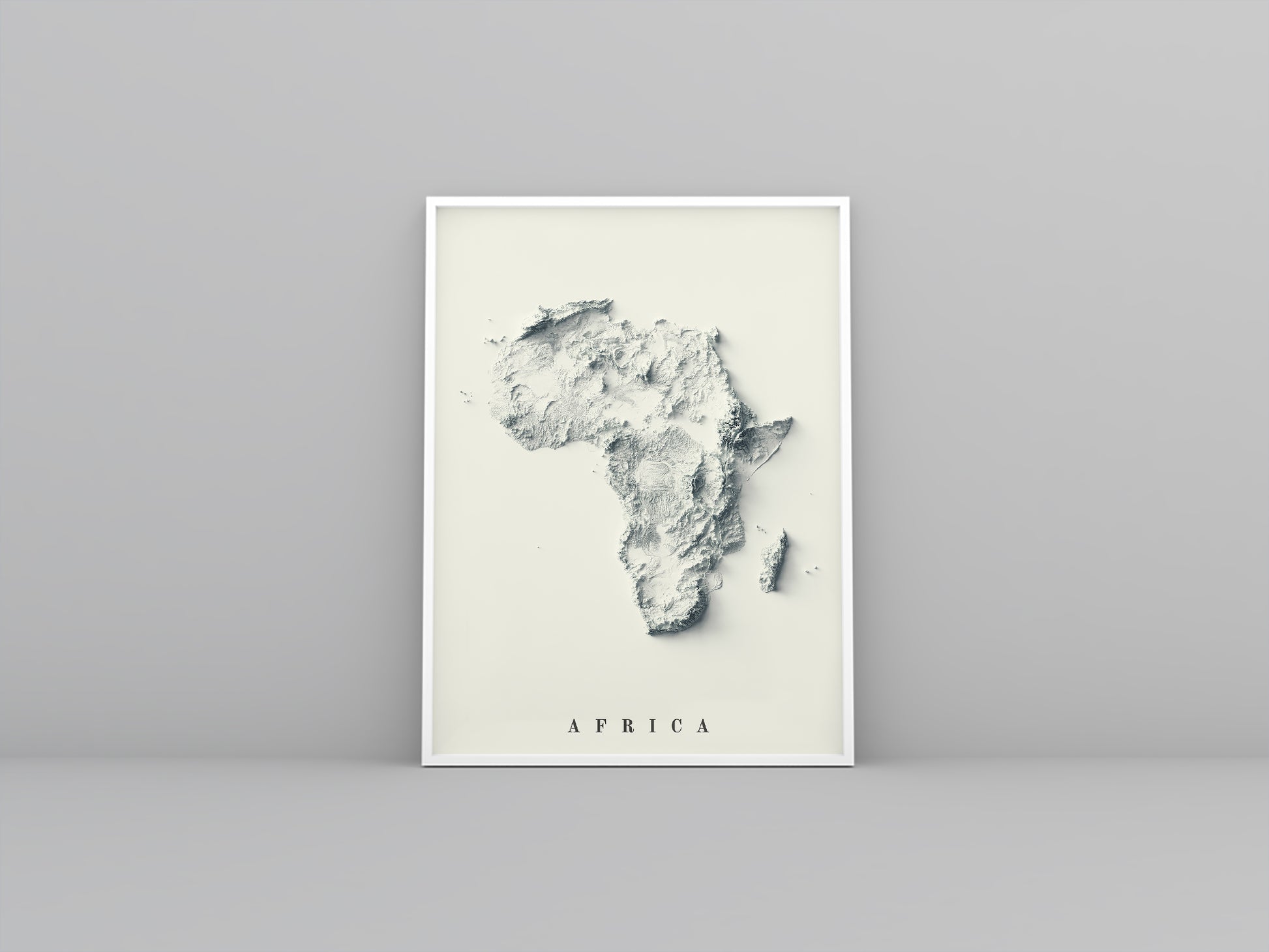 Africa framed shaded relief map in white frame. Artistic print highlighting mountains with a realistic 3d effect