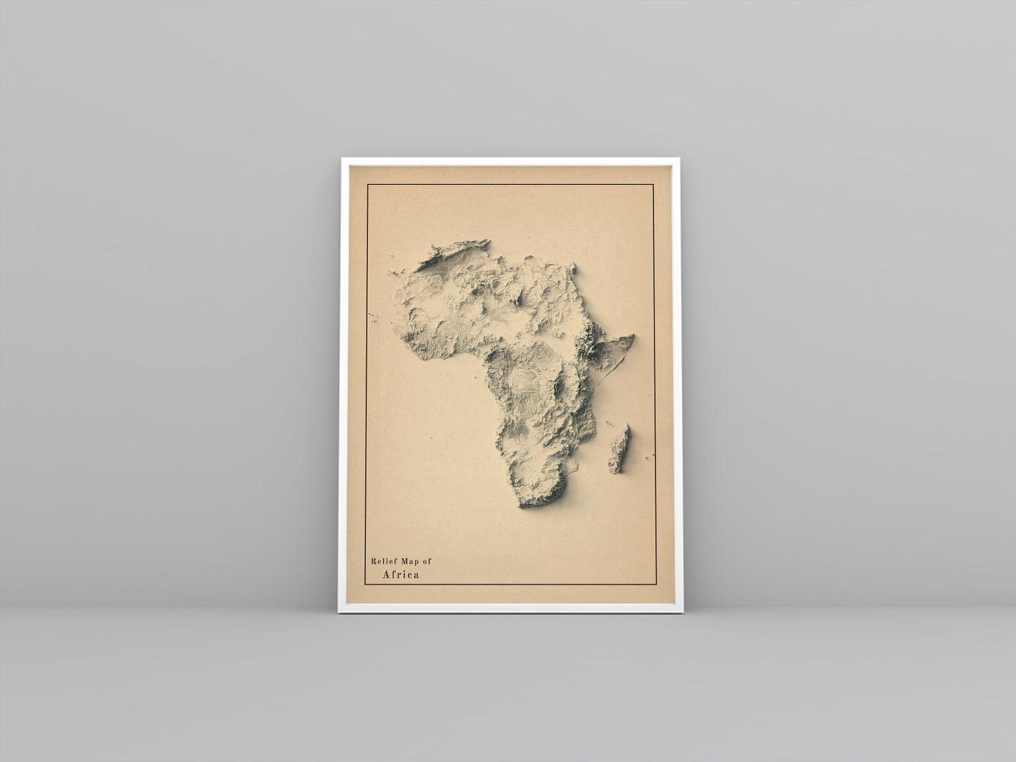 Africa framed shaded relief map in white frame. Artistic print highlighting mountains with a realistic 3d effect