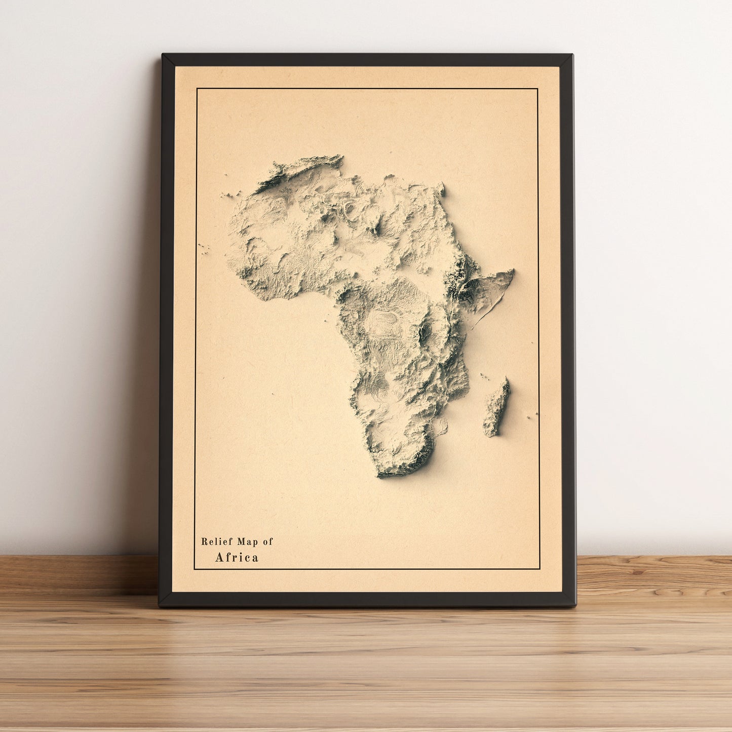 Africa vintage framed shaded relief map in black frame. Artistic print highlighting mountains with a realistic terrain effect