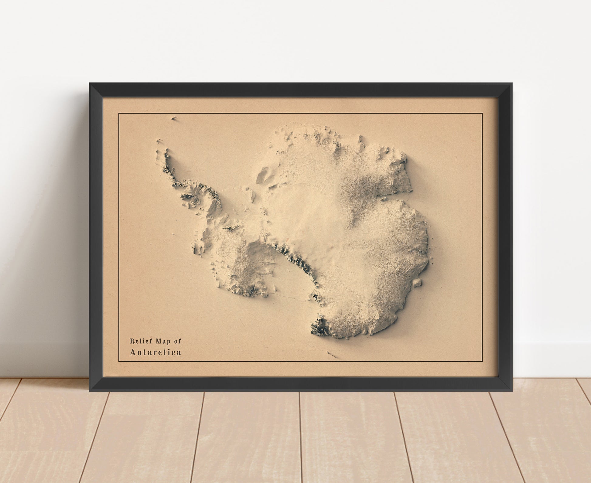 Vintage Antarctica shaded relief map in black frame. Artistic print with realistic terrain effect for wall decor