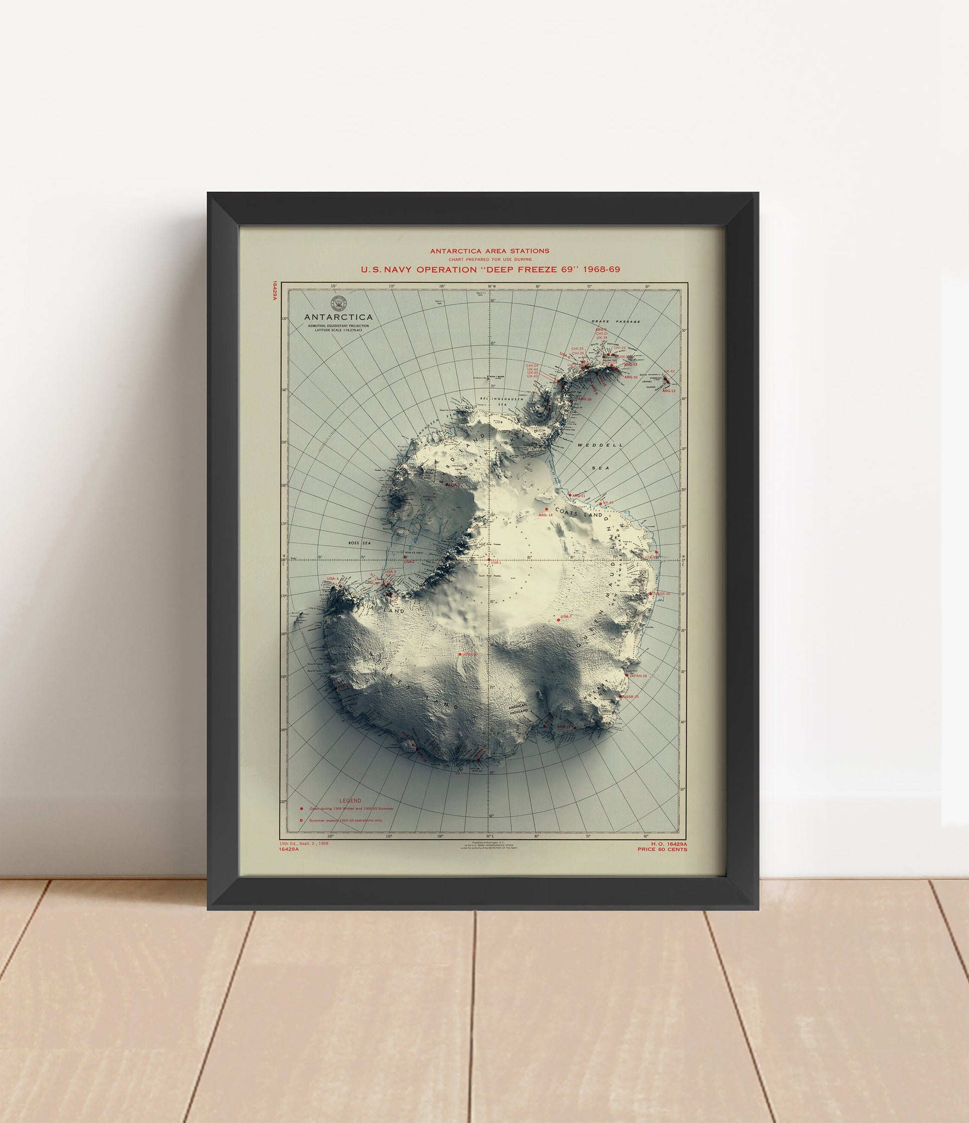 Vintage Antarctica shaded relief map in black frame. Artistic print with realistic terrain effect for wall decor