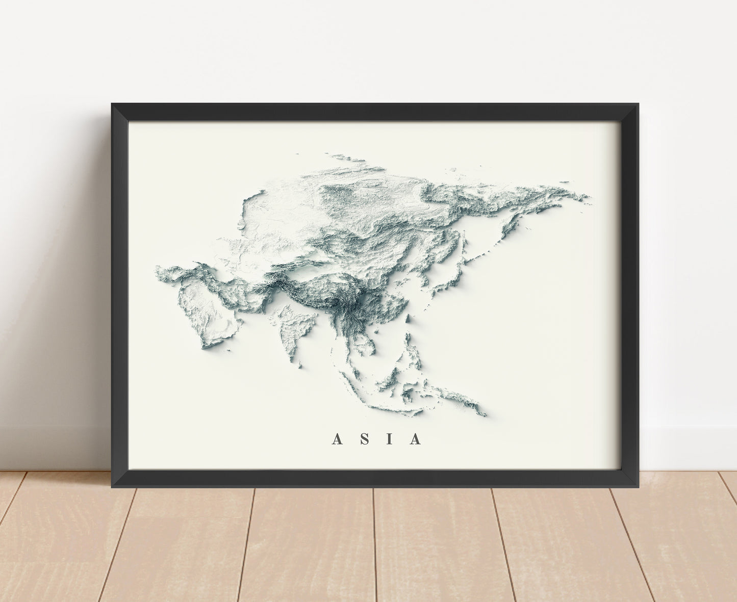 Asia shaded relief map in black frame. Artistic print with realistic terrain effect for wall decor