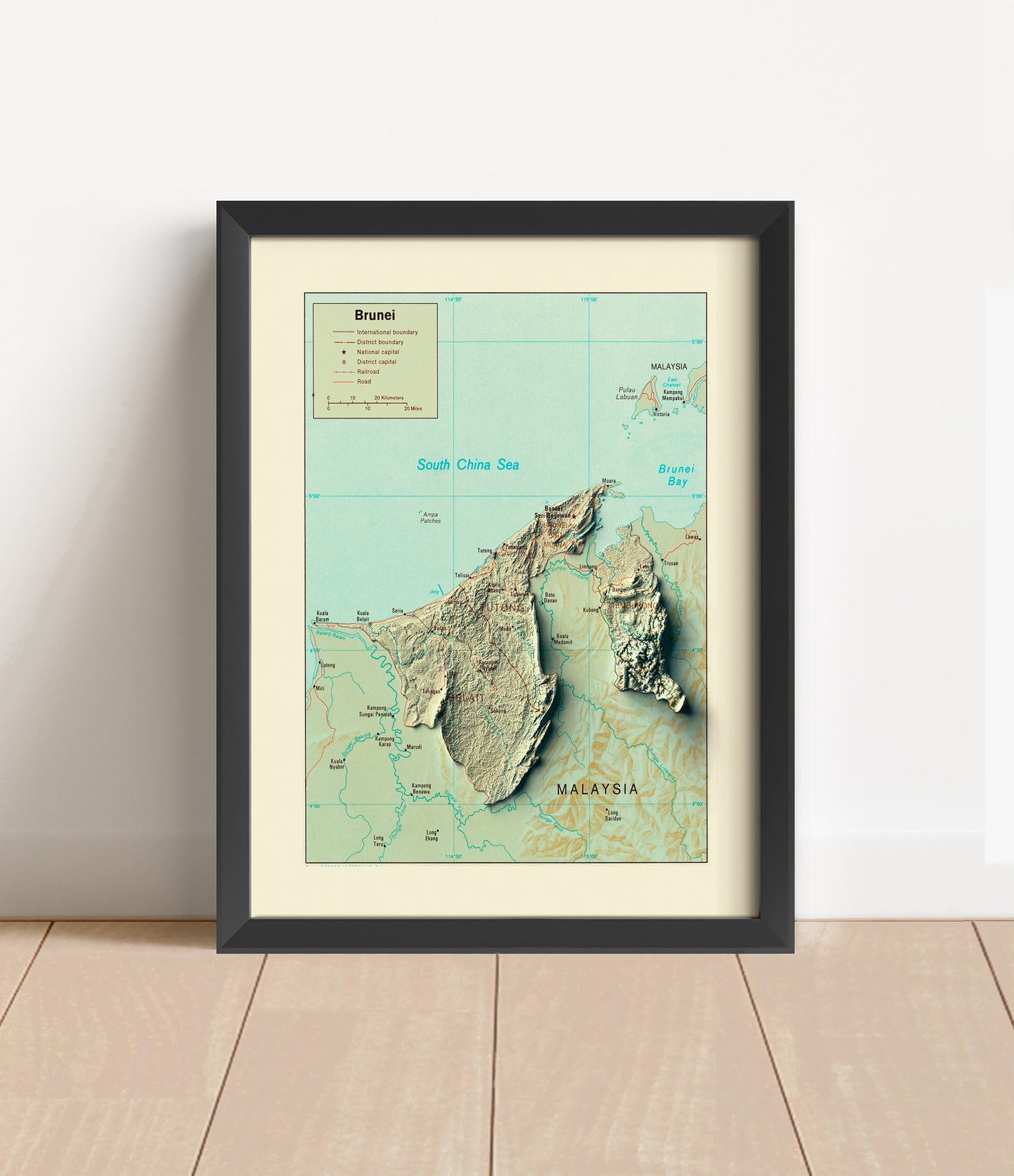 Vintage Brunei shaded relief map in black frame. Artistic print with realistic terrain effect for wall decor
