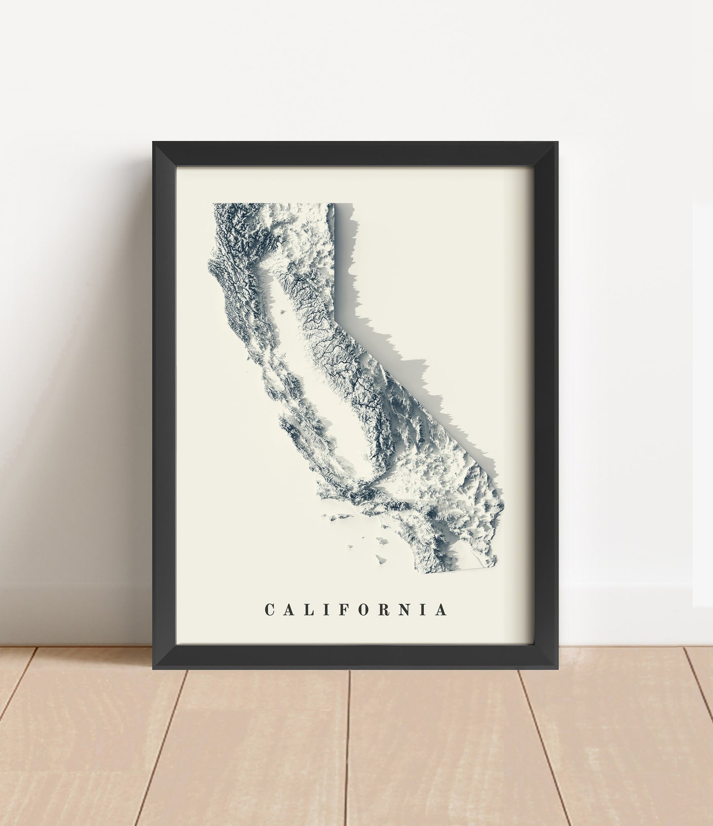 California shaded relief map in black frame. Artistic print with realistic terrain effect for wall decor