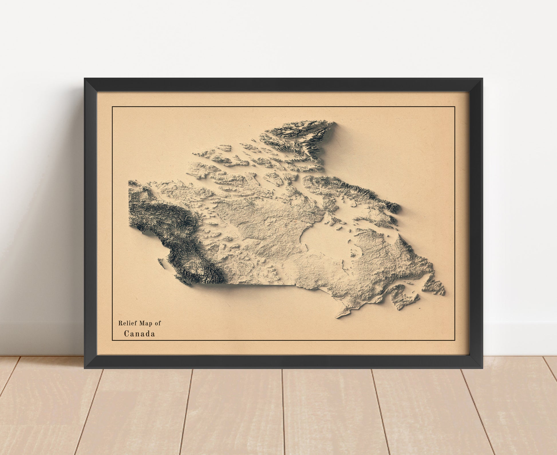 Vintage Canada shaded relief map in black frame. Artistic print with realistic terrain effect for wall decor