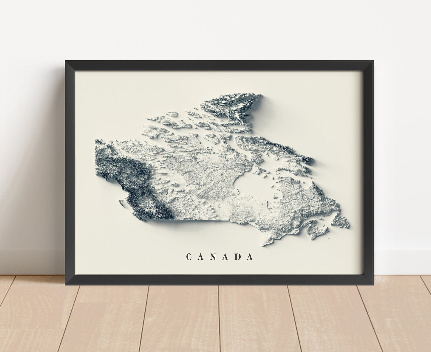 Canada shaded relief map in black frame. Artistic print with realistic terrain effect for wall decor