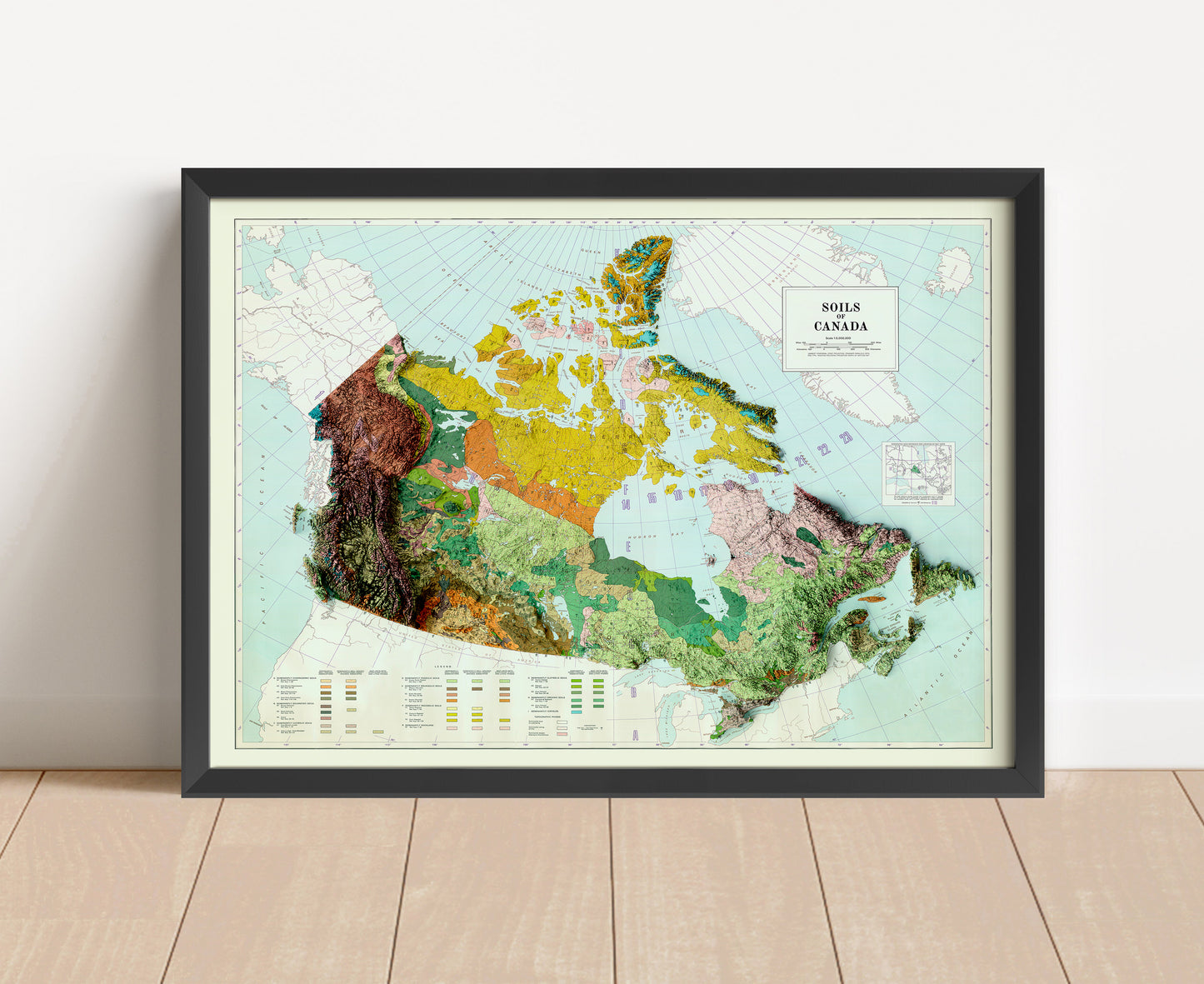 Vintage Canada shaded relief map in black frame. Artistic print with realistic terrain effect for wall decor