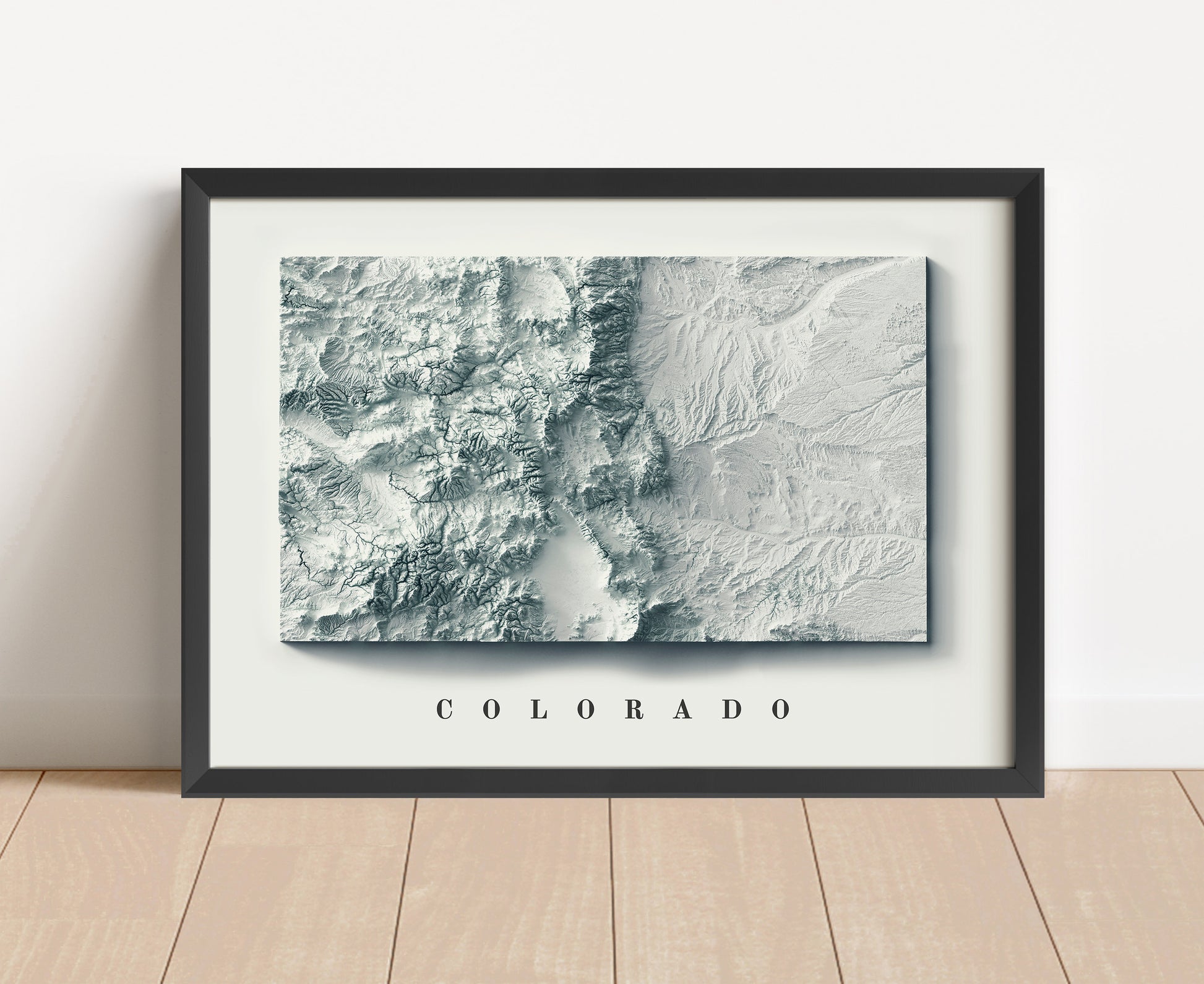 Colorado shaded relief map in black frame. Artistic print with realistic terrain effect for wall decor