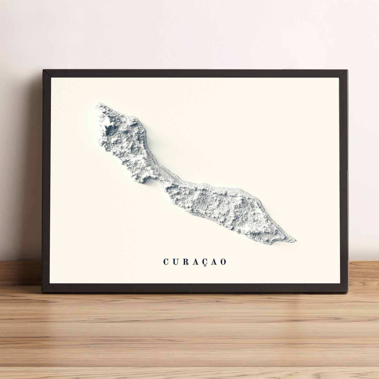 Curaçao framed shaded relief map in black frame. Artistic print highlighting mountains with a realistic terrain effect