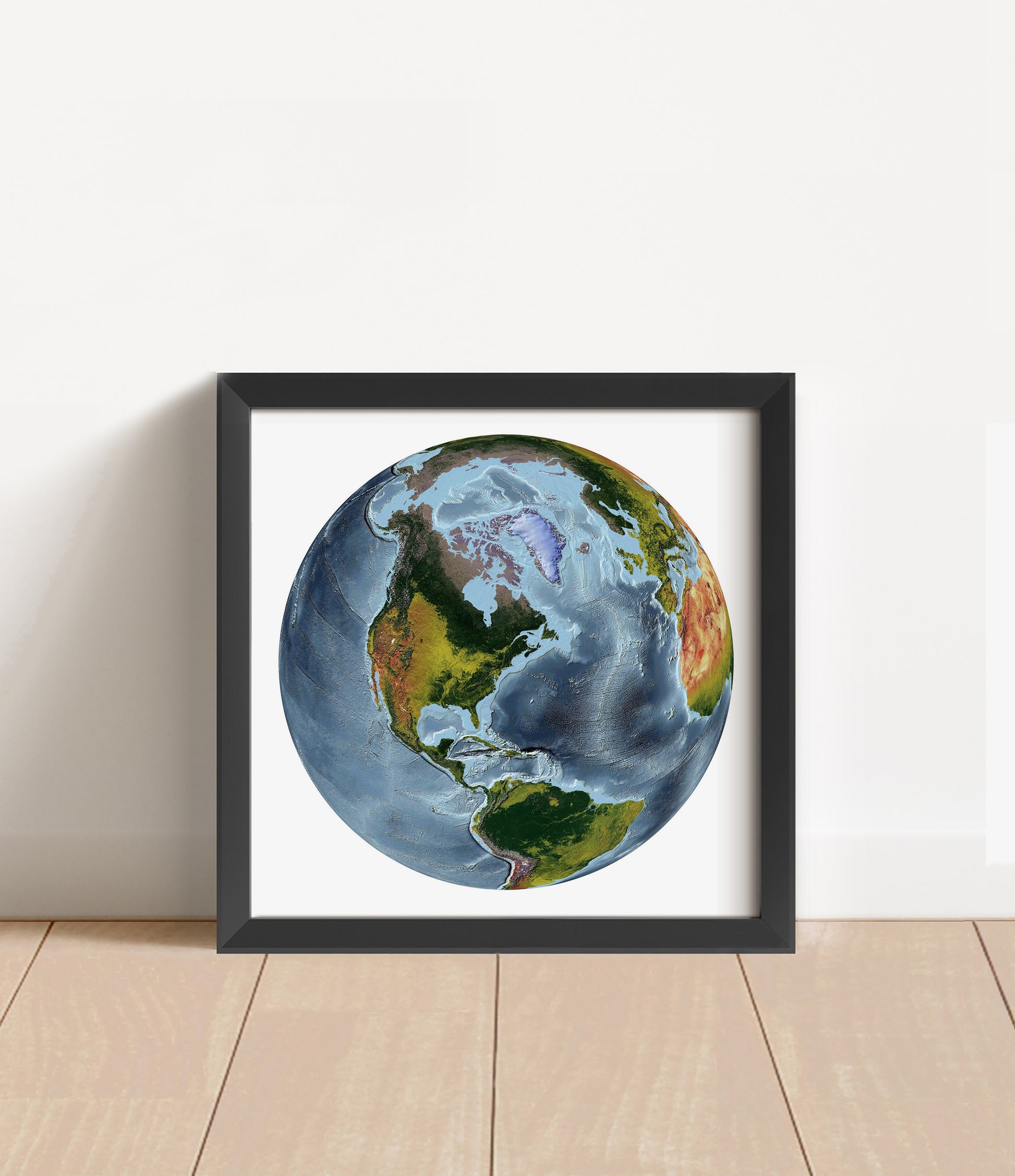 Shaded relief world map in The World From Space projection in black frame. Artistic print with realistic terrain effect for wall decor