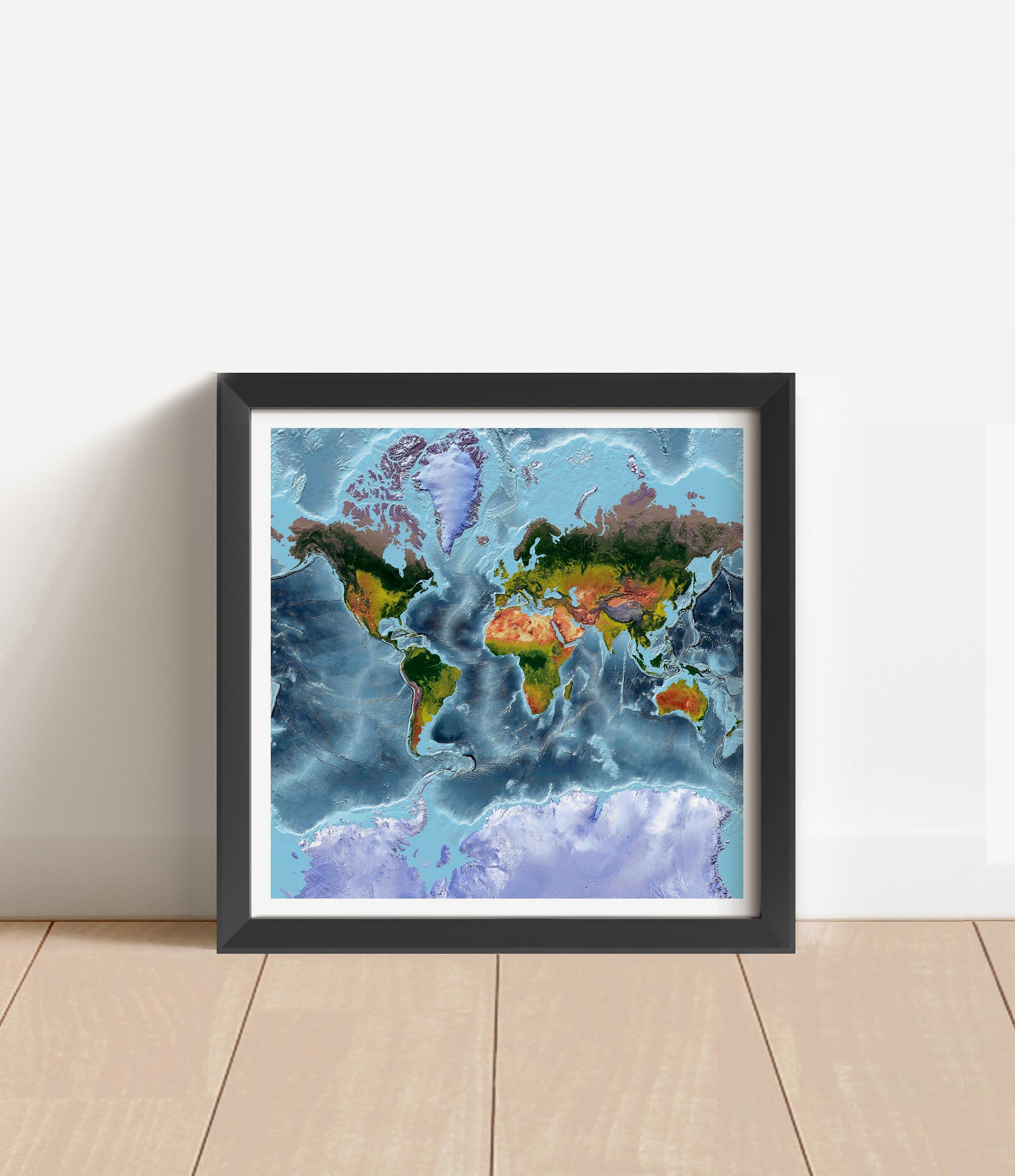 Shaded relief world map in Mercator projection in black frame. Artistic print with realistic terrain effect for wall decor