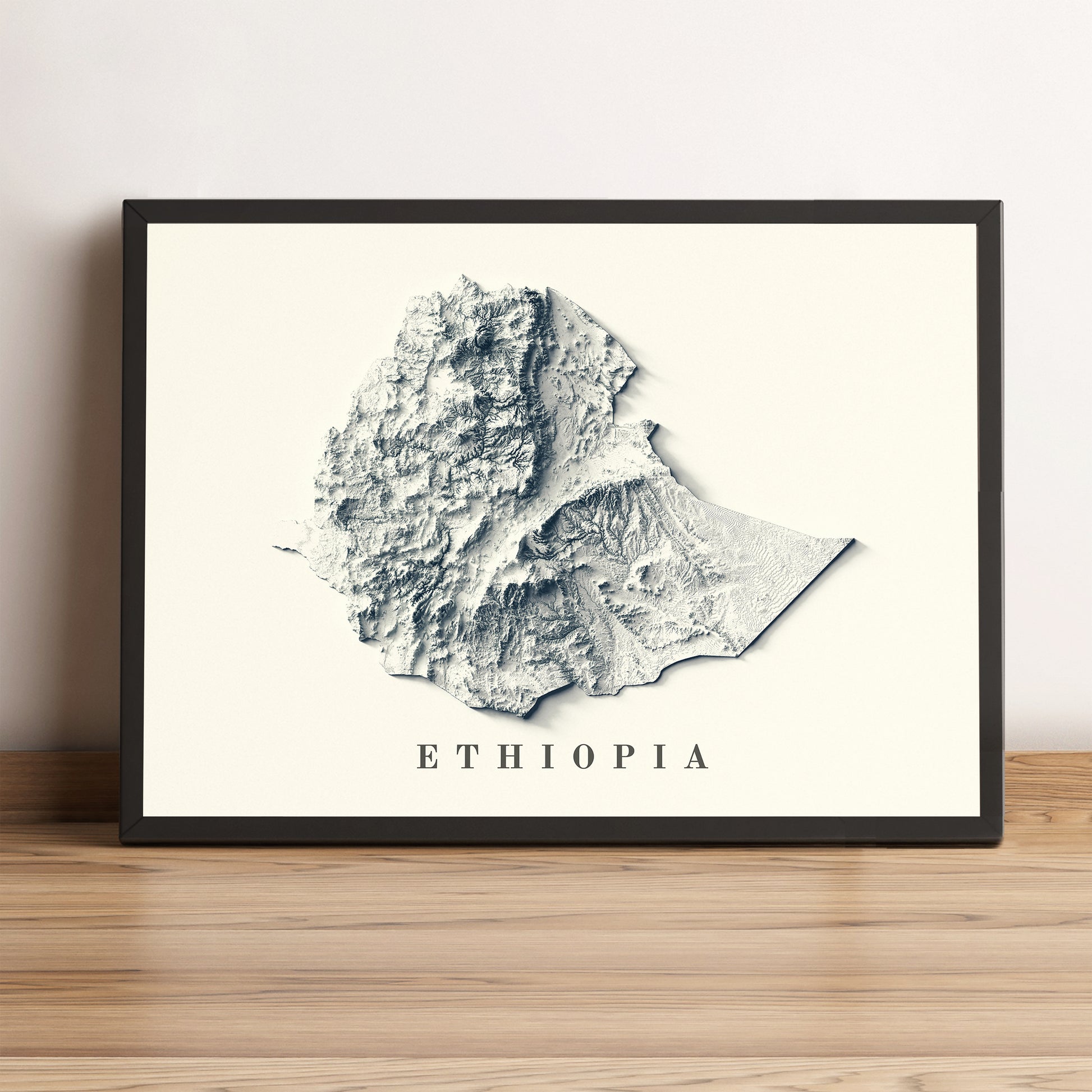 Ethiopia framed shaded relief map in black frame. Artistic print highlighting mountains with a realistic terrain effect